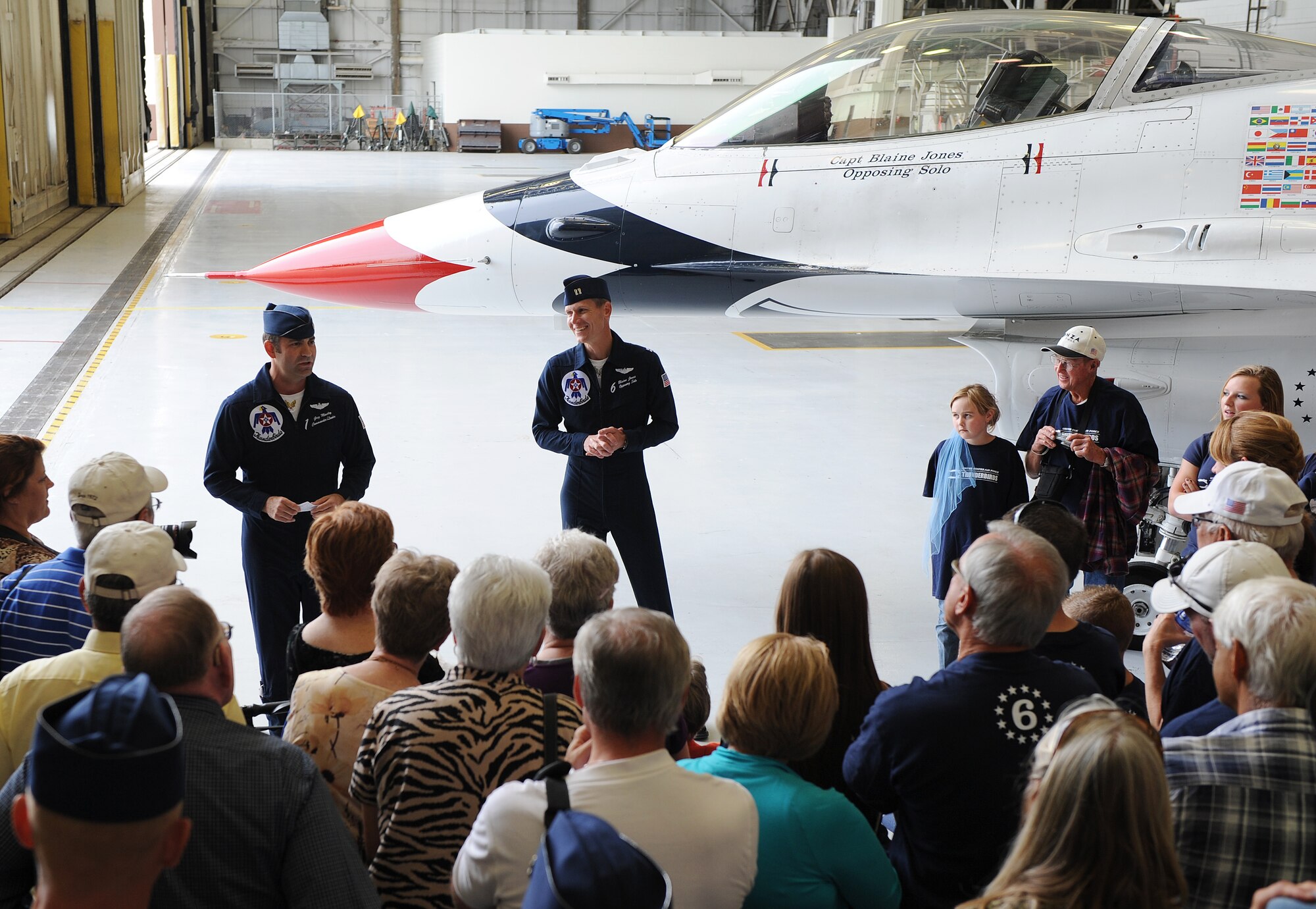Lt. Col. Greg Moseley, U.S. Air Force Thunderbirds commander, recognizes Capt. Blaine Jones, U.S. Air Force Thunderbirds opposing solo pilot, during a “FARKLE” ceremony Sept. 29, 2012, McConnell Air Force Base, Kan. FARKLE ceremonies, or Family and Relatives, Kinfolk, Loved-ones, and Everyone else, are the Thunderbirds' way of showing their support for fellow team members when an air show takes place in that member's home state. (U.S Air Force photo/Airman 1st Class Katrina M. Brisbin)