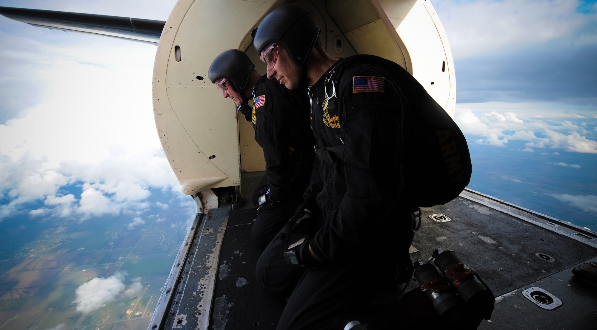 Sgt. 1st Class J.D. Berentis, U.S. Army Golden Knights gold demonstration team leader, and Sgt. 1st Class Dustin Peregrin, U.S. Army Golden Knights gold demonstration team member, monitor wind speeds by watching streamers Sept. 28, 2012, Wichita, Kan. The Golden Knights were in town for the 2012 “Wings Over McConnell” Open House and Air Show, a free event the base sponsored to enhance the public awareness of Air Force life and showcase Airmen. (U.S. Air Force photo/Airman 1st Class Katrina M. Brisbin)