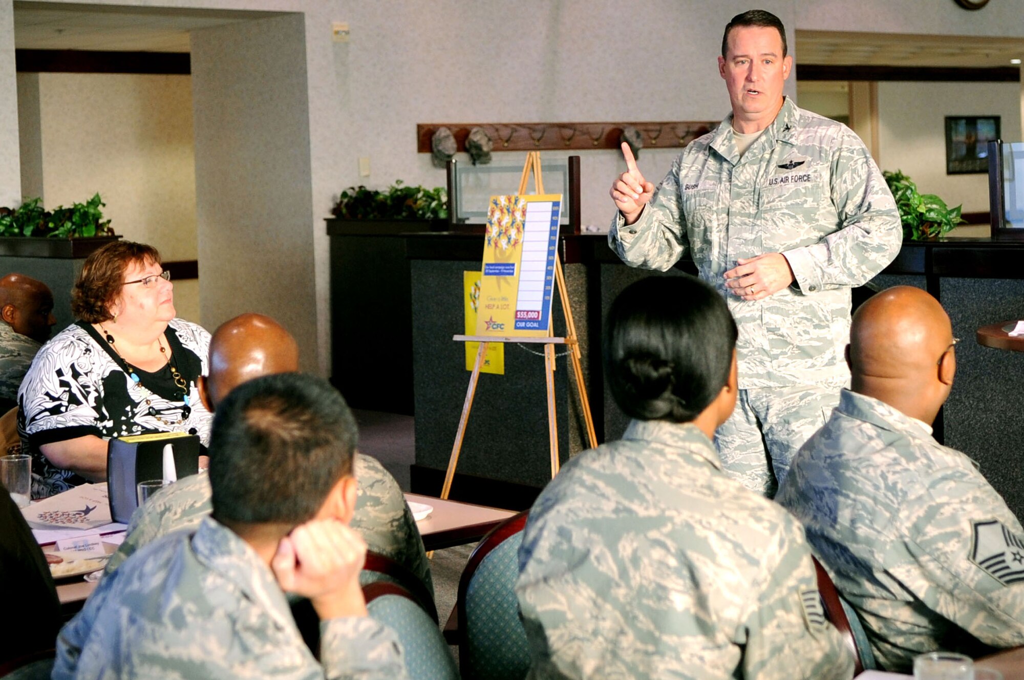 Col. Tim Bush, 319th Air Base Wing commander, speaks during the Combined Federal Campaign kick-off ceremony, which took place Sept. 28, 2012, at the Airey Dining Facility on Grand Forks Air Force Base, N.D. The CFC is the world’s largest annual workplace charity campaign. Its mission is to promote and support philanthropy through a program that is employee-focused, cost-efficient, and effective in providing all federal employees the opportunity to improve the quality of life for all. (U.S. Air Force photo/Staff Sgt. Amanda N. Grabiec)