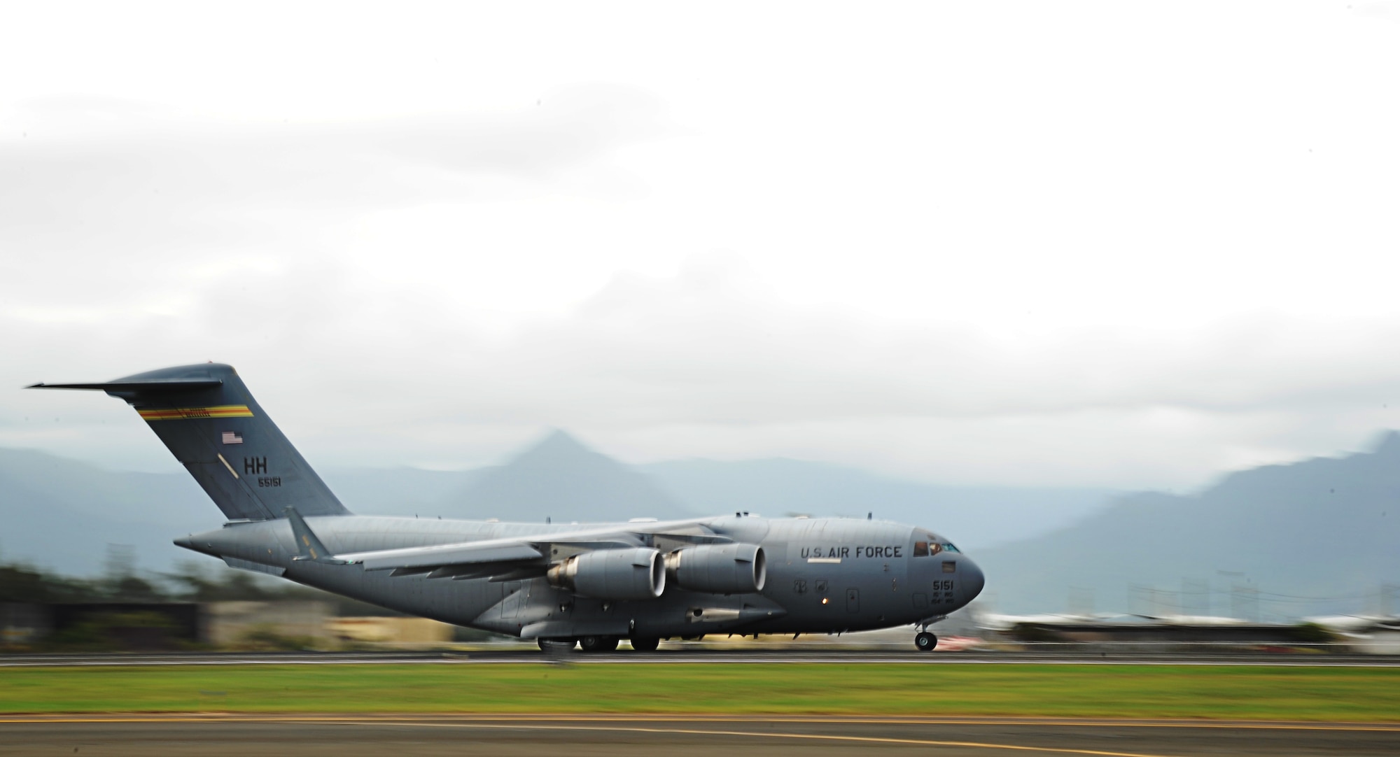 The Pacific Air Forces C-17 Globemaster III demonstration team taxis down the runway at the 2012 Kaneohe Bay Air Show at Marine Corps Base Hawaii, Sept. 29. The demonstration team performed for more than 100-thousand spectators over the course of the weekend. (U.S. Air Force photo/Senior Airman Lauren Main)
