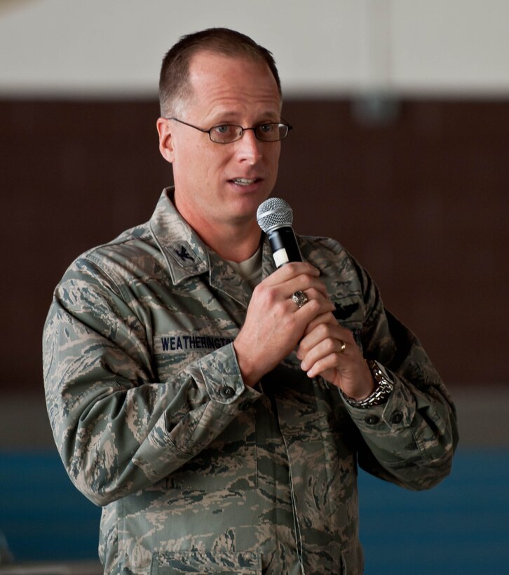 Col. Mark Weatherington, 28th Bomb Wing commander, addresses his Airmen and introduces guest speakers during the base’s Safety Day at the Pride Hangar on Ellsworth Air Force Base, S.D., Sept. 27, 2012. A “Street Smart: program presented by the Stay Alive from Education program, presented by firefighters and paramedics who share, real life crash response experiences, in an attempt to educate Ellsworth Airmen and help them make safer choices. (U.S. Air Force photo by Airman 1st Class Zachary Hada/Released)