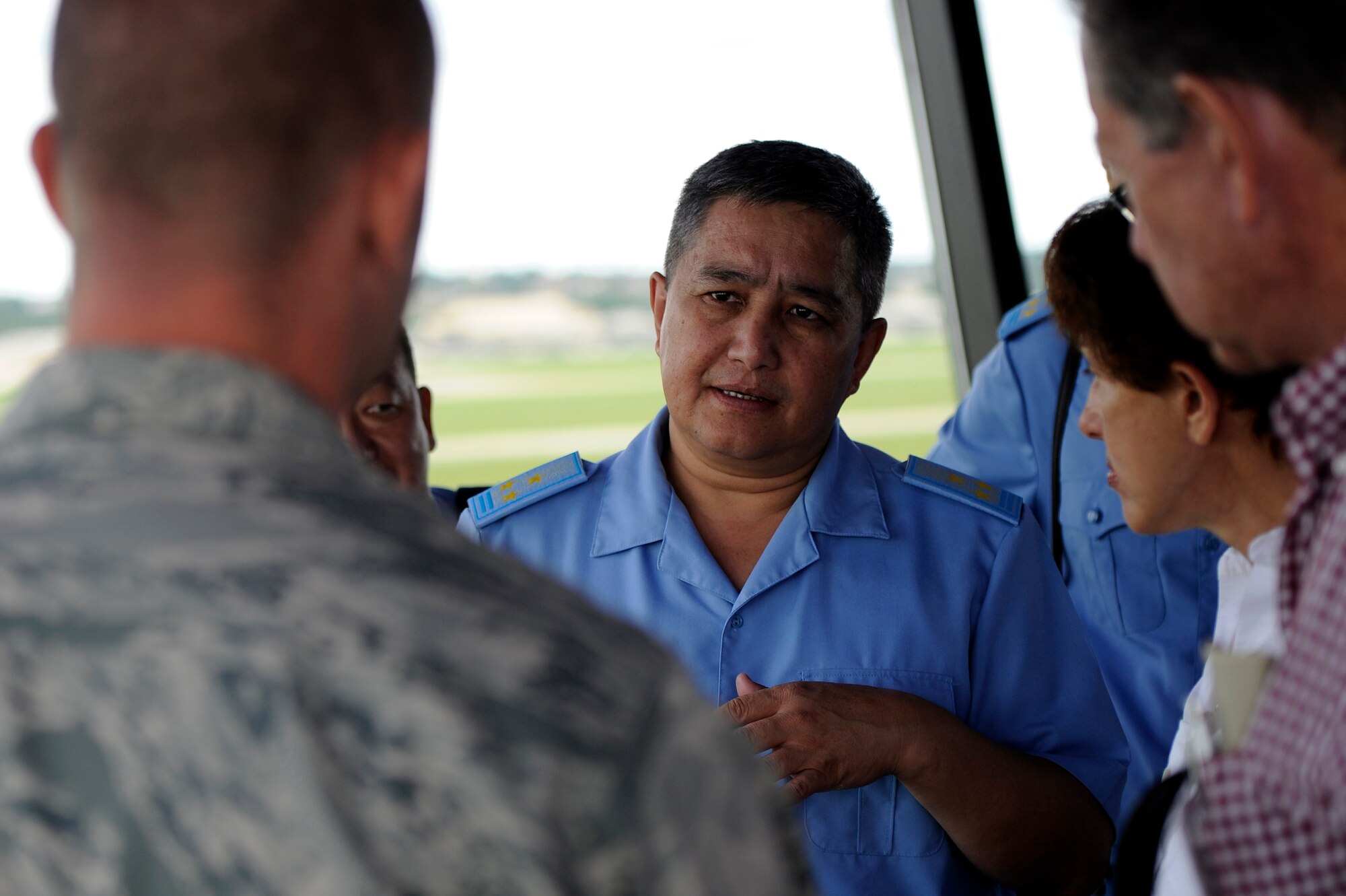 Kazakhstan Air Defense Forces Col. Murat Kazhmuratov, main directorate for supervision over aviation safety, asks questions about Shaw’s flight tower operations, Sept. 19, 2012, Shaw Air Force Base, S.C. The Kazakhstan ADF visited Shaw for two days to learn about the 20th Fighter Wing’s safety programs and how they work. (U.S. Air Force photo by Staff Sgt. Kenny Holston/Released) 