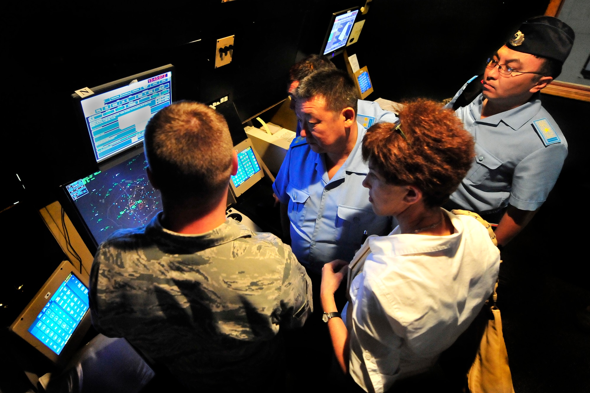 Members of the Kazakhstan Air Defense Forces get a close-up look at different radars and monitors used by radar approach controllers, Sept. 19, 2012, Shaw Air Force Base, S.C. The Kazakhstan ADF visited Shaw for two days to learn about the 20th Fighter Wing’s safety programs and how they work. (U.S. Air Force photo by Staff Sgt. Kenny Holston/Released)