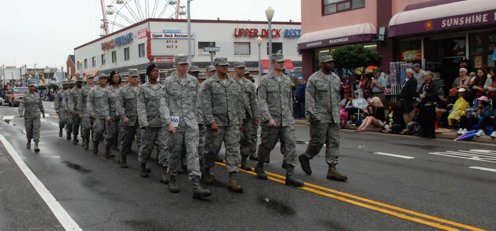 A flight of Airmen silently marches during the Neptune Festival Grand Parade Sept. 29, 2012, at Virginia Beach, Va. Senior Master Sgt. Leyla Gillett, Langley Air Force Base Airman Leadership School commandant, led the flight of ALS Airmen. (U.S. Air Force photo by Airman 1st Class Austin Harvill/Released)