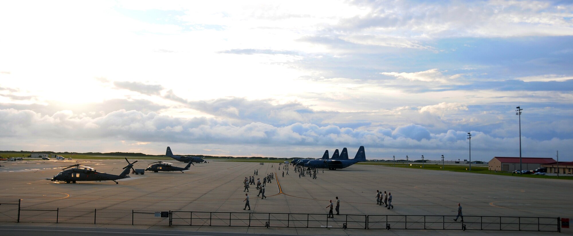920th Maintenance Squadron Airmen, Patrick Air Force Base, Fla., conduct a Foreign Object Debris walk on the flight line here. Airplane parts, nuts, bolts, trash and rocks found in the wrong place are just a few examples known as FOD. When FOD ends up on the flight line it can cause serious damage to aircraft.  The maintainers routinely form a human chain, scanning the flight line to remove any FOD found, preventing potential aircraft damage. FOD prevention is not only directed at maintainers and aircrew, support staff that only have a small footprint on the flight line also need to practice FOD prevention. “If you drop it pick it up" (U.S. Air Force photo/Tech. Sgt. Peter Dean)   