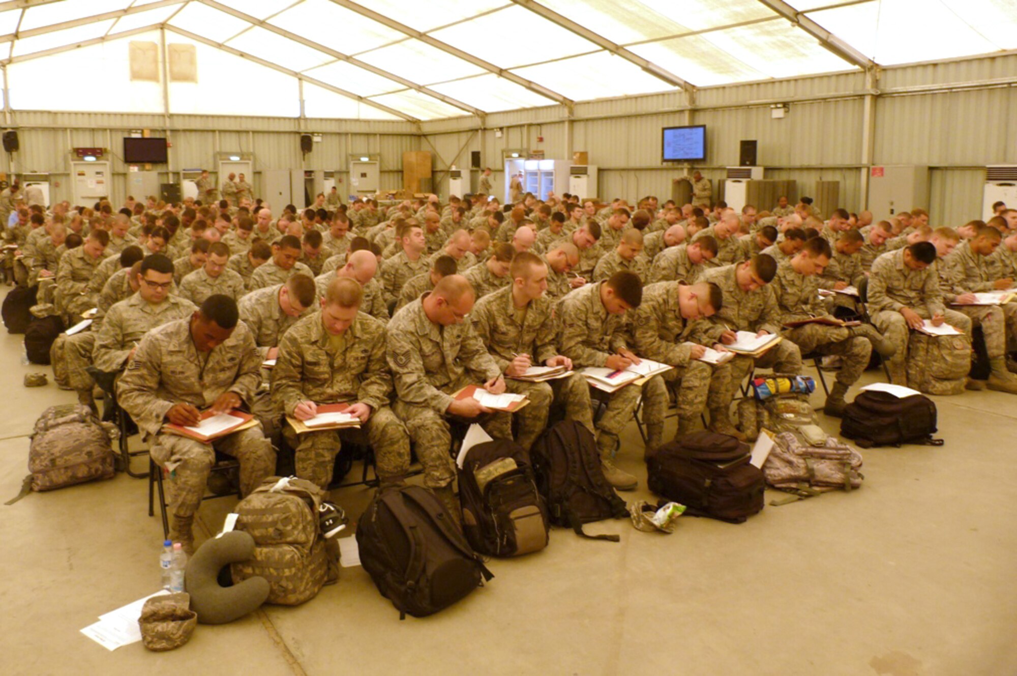 SOUTHWEST ASIA - U.S. Air Force Airmen arriving to the 380th Air Expeditionary Wing inprocess Sept. 20, 2012. The 380th EFSS PERSCO flight is responsible for accountability and casualty reporting here. (U.S. Air Force photo/Senior Master Sgt. Charlie Flores)
