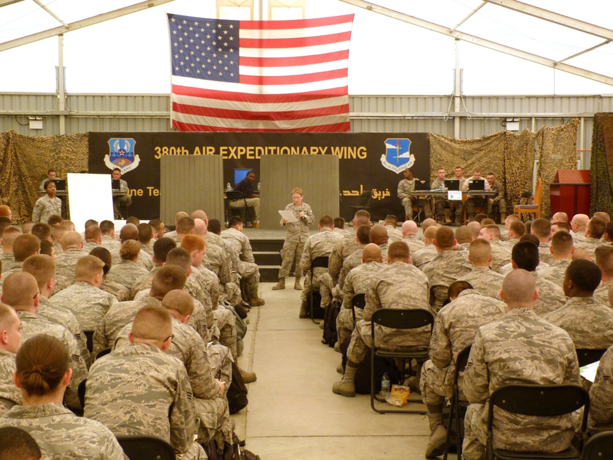 SOUTHWEST ASIA - U.S. Air Force Senior Airman Kirsten Rapp, 380th Expeditionary Force Support Squadron Personnel Support for Contingency Operations, or PERSCO, sustainment technician, briefs Airmen after their arrival to the 380th Air Expeditionary Wing Sept. 20, 2012. Rapp, an Enola, Pa., native, is deployed from Schriever Air Force Base, Colo. (U.S. Air Force photo/Senior Master Sgt. Charlie Flores)
