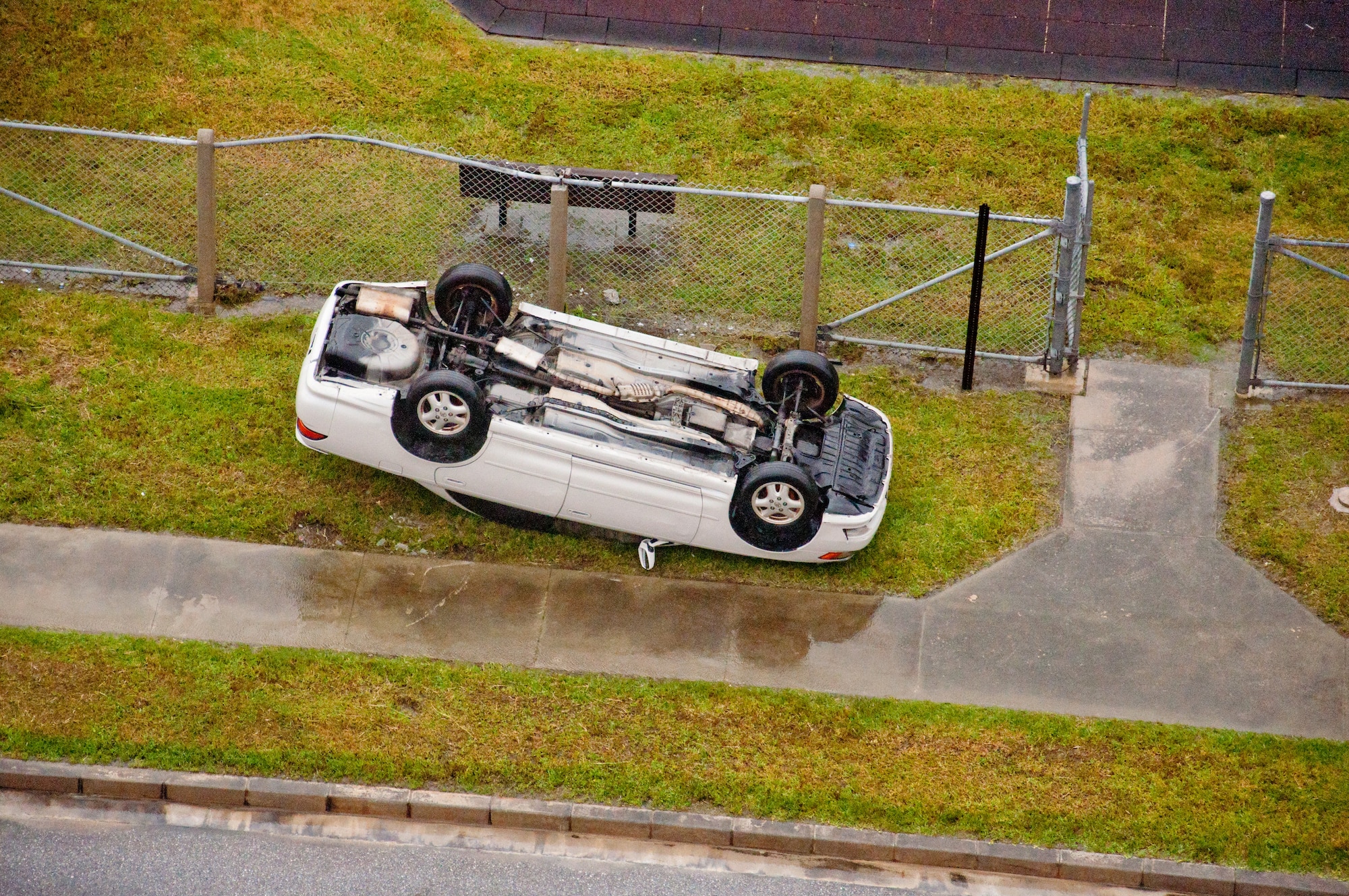 Typhoon Jelawat's wind gusts exceeded 135 mph, which sent some vehicles, trash containers and other heavy objects rolling down streets. (U.S. Air Force courtesy photo)
