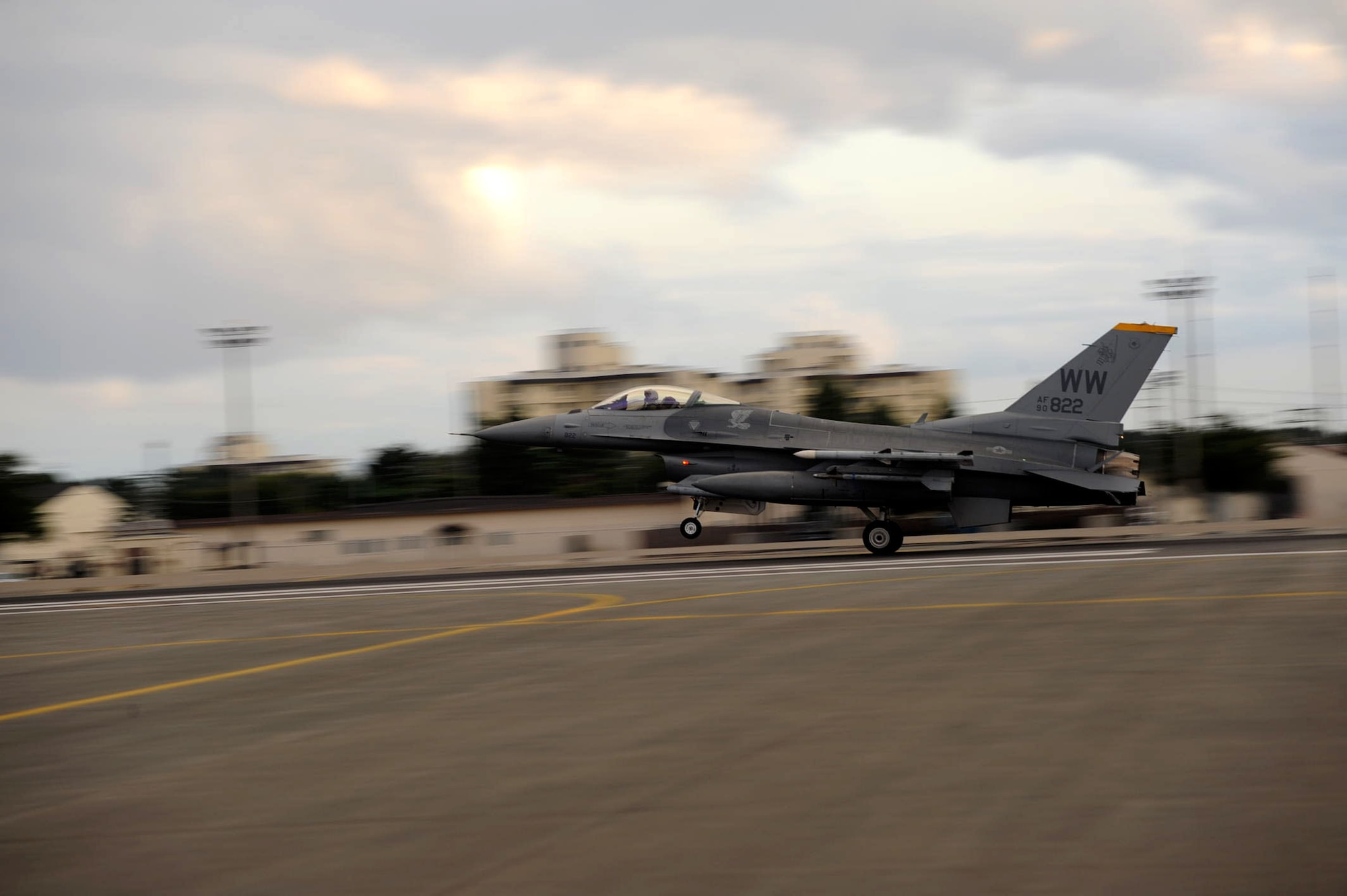 A U.S. F-16 Fighting Falcon aircraft lands on the flightline at Misawa Air Base, Japan, Sept. 26, 2012. The Pacific Air Force flying hour program is used to maintain the budget for fighter jets. Congress designates the number of flying hours for tactical fighter bombers per fiscal year.(U.S. Air Force photo by Airman 1st Class Kenna Jackson)