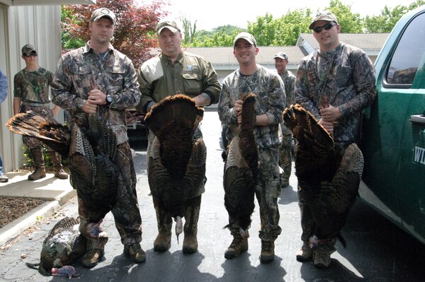 (Left to right) Staff Sgt. Joseph Lowery, Staff Sgt. Michael D. Davis, Staff Sgt. Joseph Bergen, Guide Dru Smith and Guide Brent Adcock pose with wild turkeys taken during a hunt at Center Hill Lake April 13, 2012.  The U.S. Army Corps of Engineers Nashville District organized the event that helps soldiers from Fort Campbell, Ky., in the “HOOAH” Program, which stands for “Healing Outside Of A Hospital.” (USACE photo by Lee Roberts)