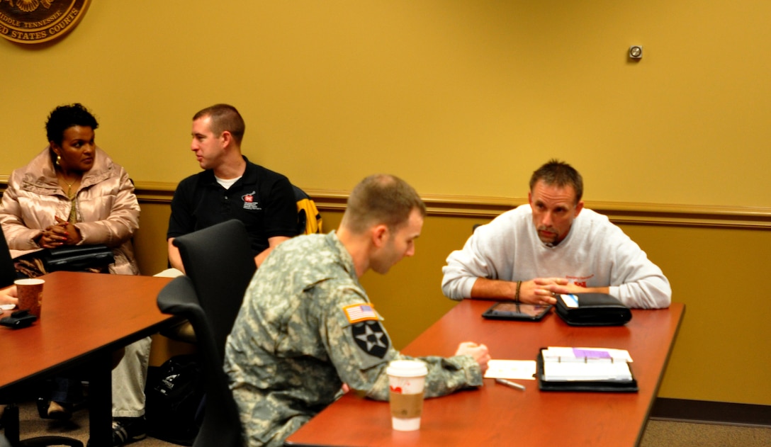 The U.S. Army Corps of Engineers Crisis Management Team meets Feb. 7, 2012 to participate in a table top exercise to exercise an earthquake scenario and review emergency plans. (USACE photo by David Wheeler)