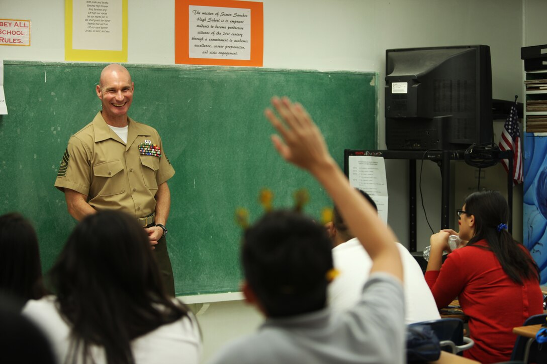SgtMaj. Robert Roddy, command sergeant major of Marine Atack Squadron 542, 31st Marine Expeditionary Unit, speaks to students of the Simon Sanchez High School during the 31st MEU and USS Bonhomme Richard port visit here, Sept. 28. The Marines and Sailors traded their last day of liberty in Guam to visit the high school and speak about the advantages of military life and the value of an education. The 31st MEU is the only continuously forward-deployed MEU and is the Marine Corps' force in readiness in the Asia-Pacific region.
