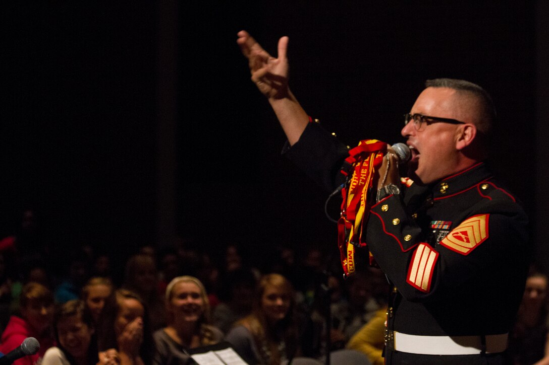 Gunnery Sgt. James R. Wallace, 1st Marine Corps District’s musician technical assistant, introduces the 2nd Marine Division Band to students of Bristol Eastern High School prior to the band’s performance here Sept. 28.  The band, from Camp Lejeune, N.C., performed in various cities in Connecticut as part of a tour of the Northeastern United States.