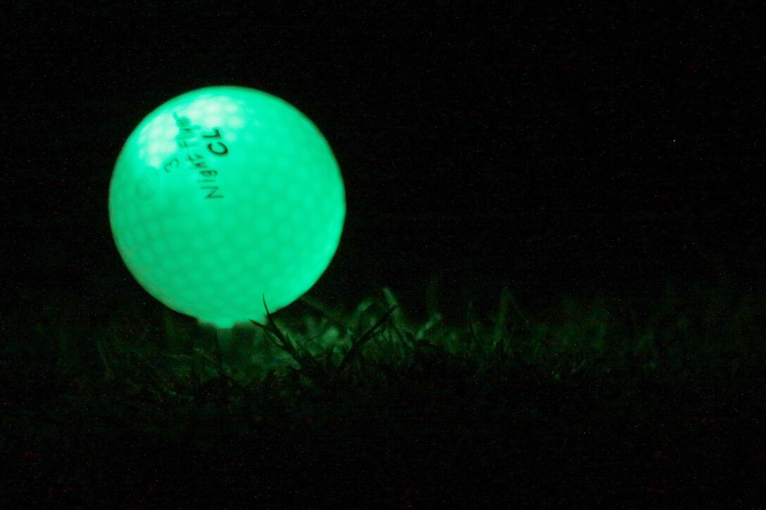 MARINE CORPS BASE CAMP PENDLETON, Calif.--Glow Ball Night Golf lit-up the Marine Memorial Golf Course aboard Marine Corps Base Camp Pendleton, Sept. 28. Competitors wearing glow necklaces teed-off on the Par 3 that was illuminated by glow sticks and flashing signs. The tournament fee provided assorted foods and drinks, green fees, and the glow ball equipment that the patrons kept as souvenirs. The Halloween Glow Ball Night Golf Tournament is scheduled to be held Oct. 26, and will feature a costume contest. For more information, call (760) 725-GOLF, or visit http://www.mccscp.com/golf. 