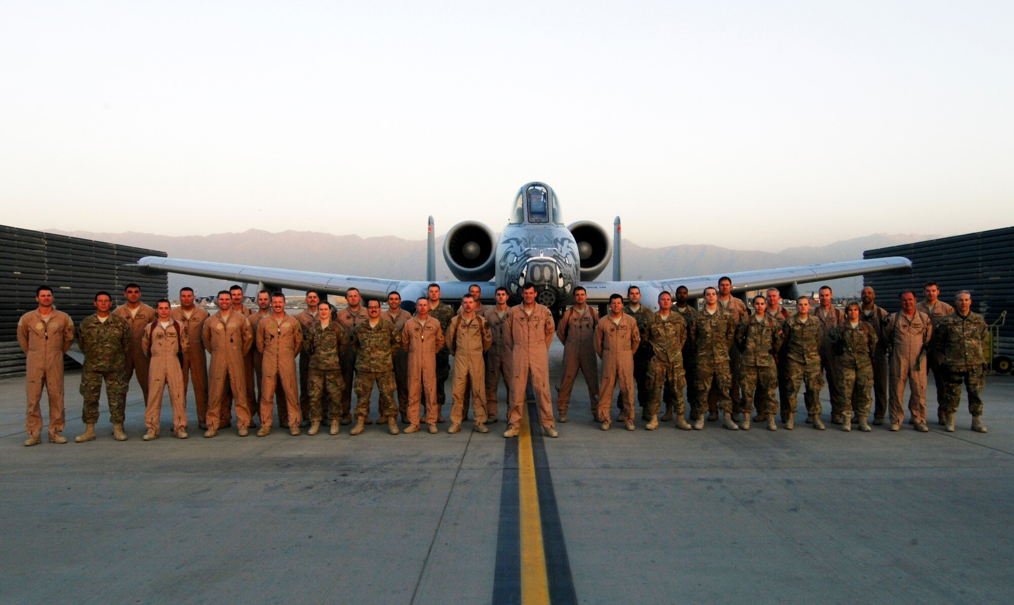 Airmen with the 188th Fighter Wing’s 184th Fighter Squadron pose for a photo at Bagram Airfield, Afghanistan, where they are currently deployed in support of Operation Enduring Freedom. While deployed, the 188th is attached to the 455th Air Expeditionary Wing.(U.S. Air Force photo by Staff Sgt. Jeff Nevison/455th Air Expeditionary Wing Public Affairs)