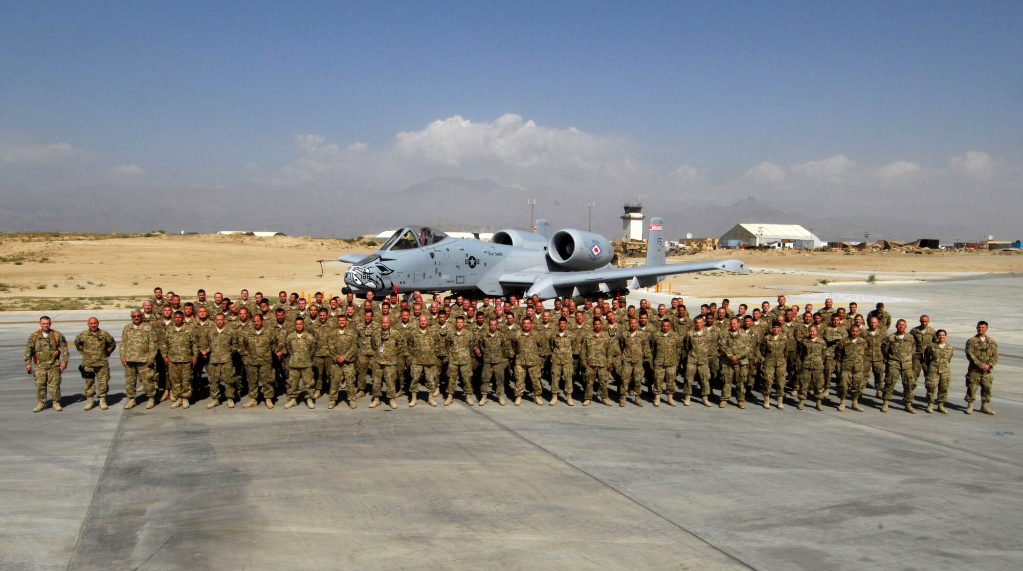 Airmen with the 188th Maintenance Group pose for a photo at Bagram Airfield, Afghanistan, where they are currently deployed in support of Operation Enduring Freedom. While deployed, the 188th is attached to the 455th Air Expeditionary Wing. (U.S. Air Force photo by Staff Sgt. Jeff Nevison/455th Air Expeditionary Wing Public Affairs)