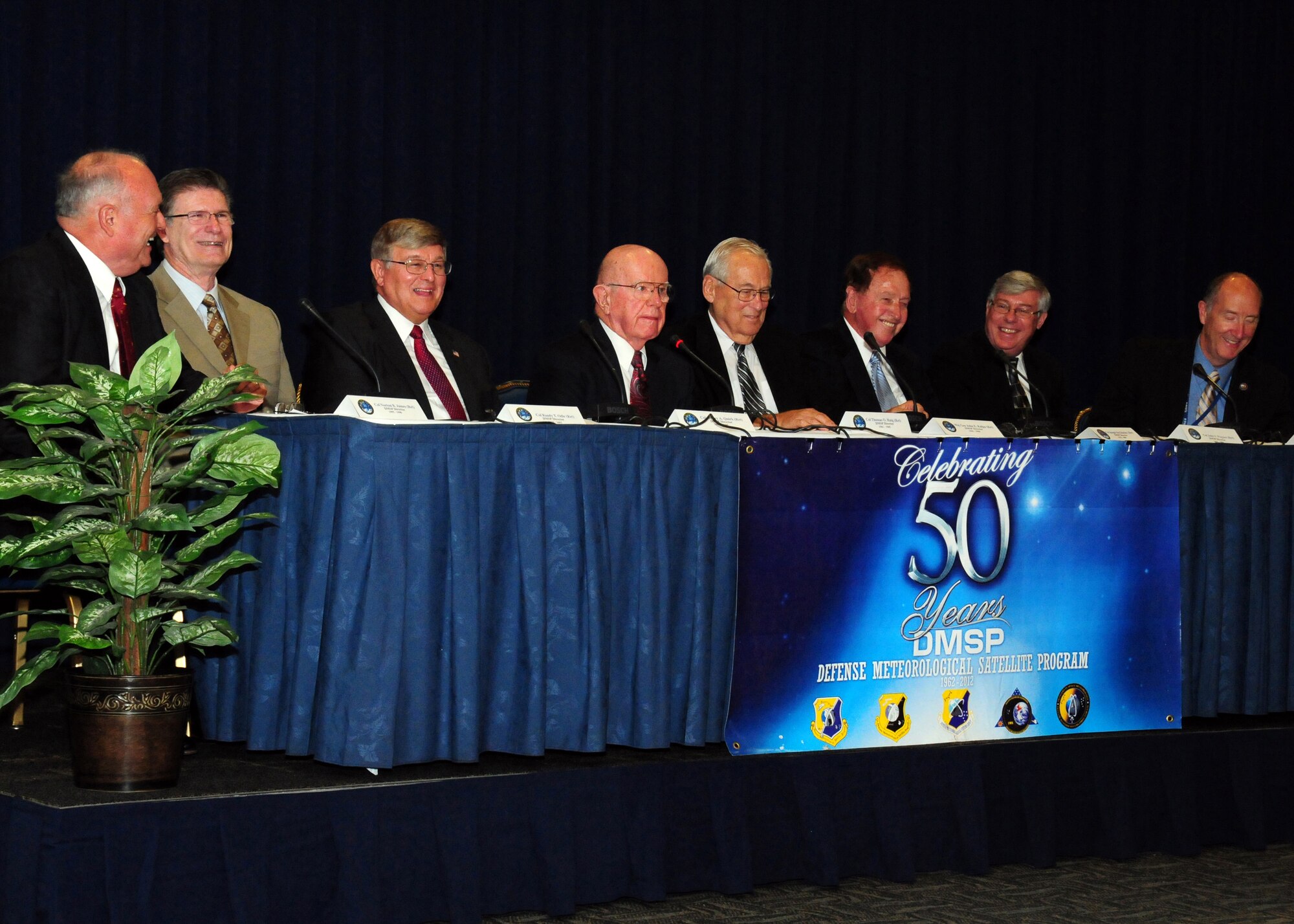 Retired DMSP directors share memories at the Partnership Council meeting, Sept. 20. Panel Members (from left to right):  Col. Norton James III, DMSP Director, 1995-1998; Col. Randy Odle, DMSP Director, 2000-2003; Col. Jeffery Quirk, DMSP Director, 1998-2000; Col. Thomas Haig, DMSP Director, 1961-1965; Maj. Gen. John Kulpa, DMSP Director, 1965-1968; Col. Joseph McGlinchey, Deputy for DMSP, 1978-1980; Col. John Wagner III, DMSP Director, 2003-2006; and Col. Stephen Pluntze, DMSG Commander, 2008-2010.  (Photo by Jim Gordon)
