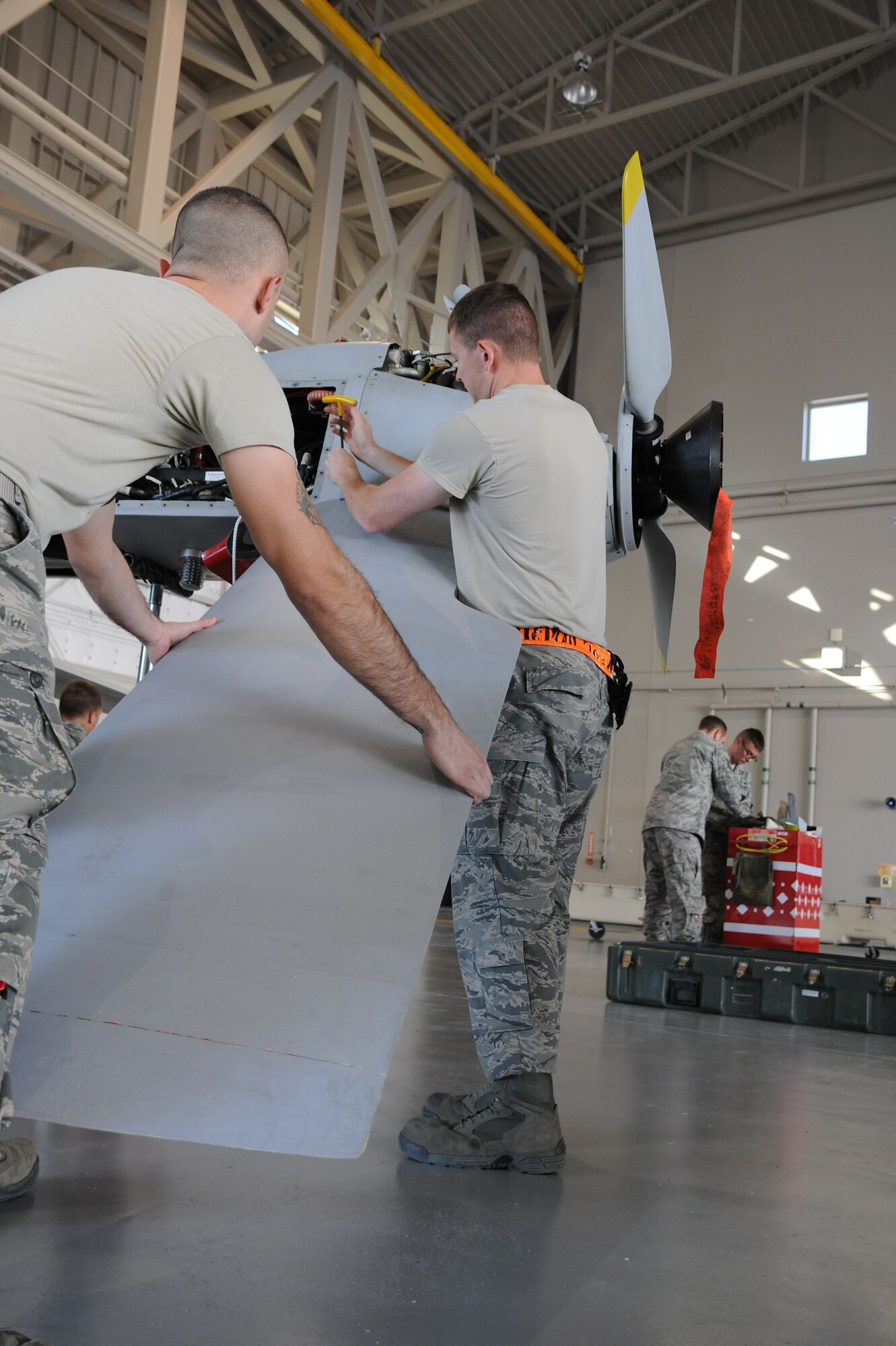 Airmen assigned to the 432d Aircraft Maintenance Squadron, disassemble an MQ-1 Predator remotely piloted aircraft (RPA) in preparation for shipment at Creech Air Force Base, Nev., Oct. 2, 2012. Armed reconnaissance, airborne surveillance and target acquisition are the primary functions of the RPA. (U.S. Air Force photo by 432d Wing/432d Air Expeditionary Wing Public Affairs)

