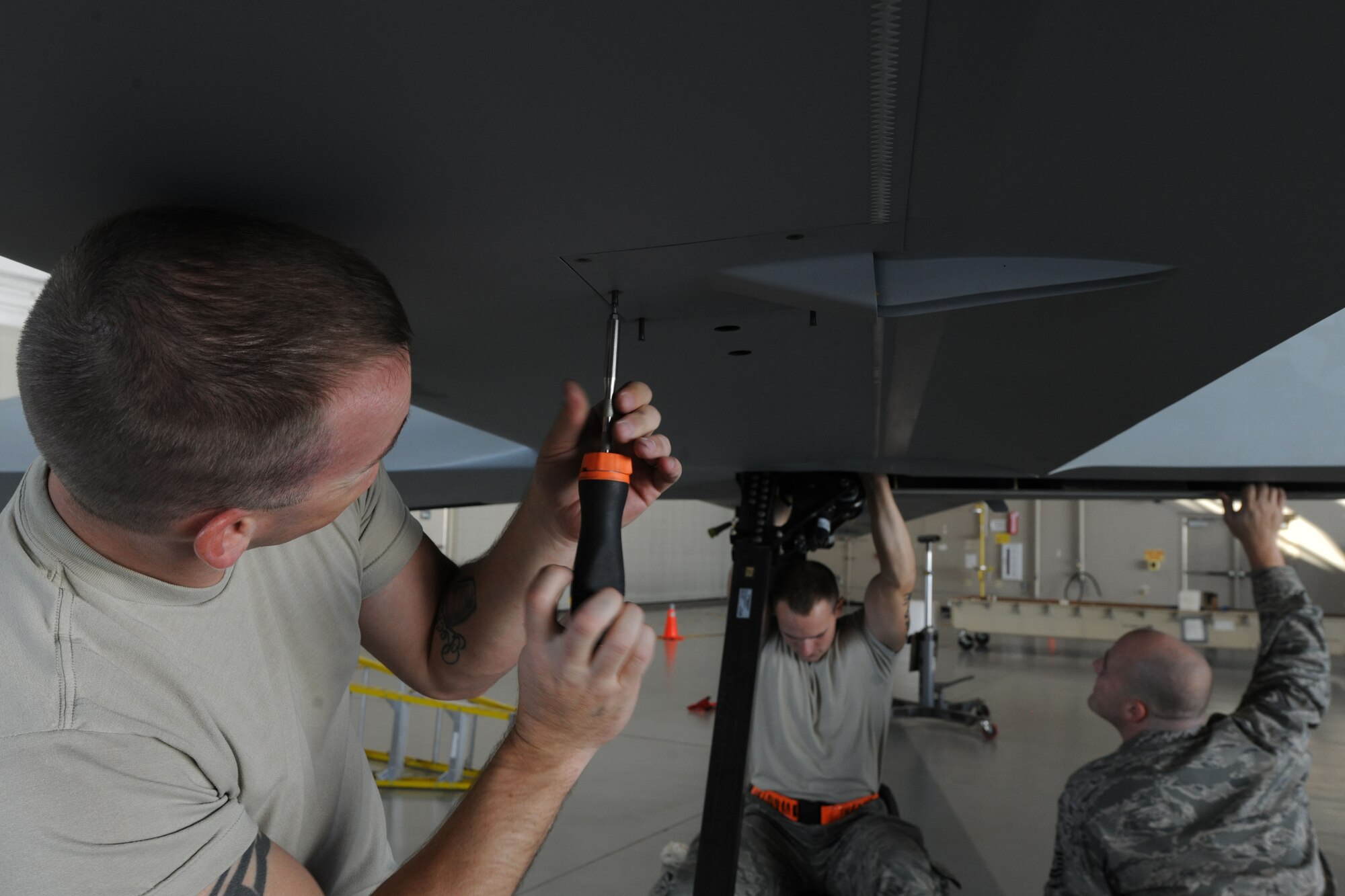 Maintainers assigned to the 432d Aircraft Maintenance Squadron disassemble an MQ-1 Predator remotely piloted aircraft (RPA) in preparation for shipment at Creech Air Force Base, Nev., Oct. 2, 2012. Armed reconnaissance, airborne surveillance and target acquisition are the primary functions of the RPA. (U.S. Air Force photo by 432d Wing/432d Air Expeditionary Wing Public Affairs)