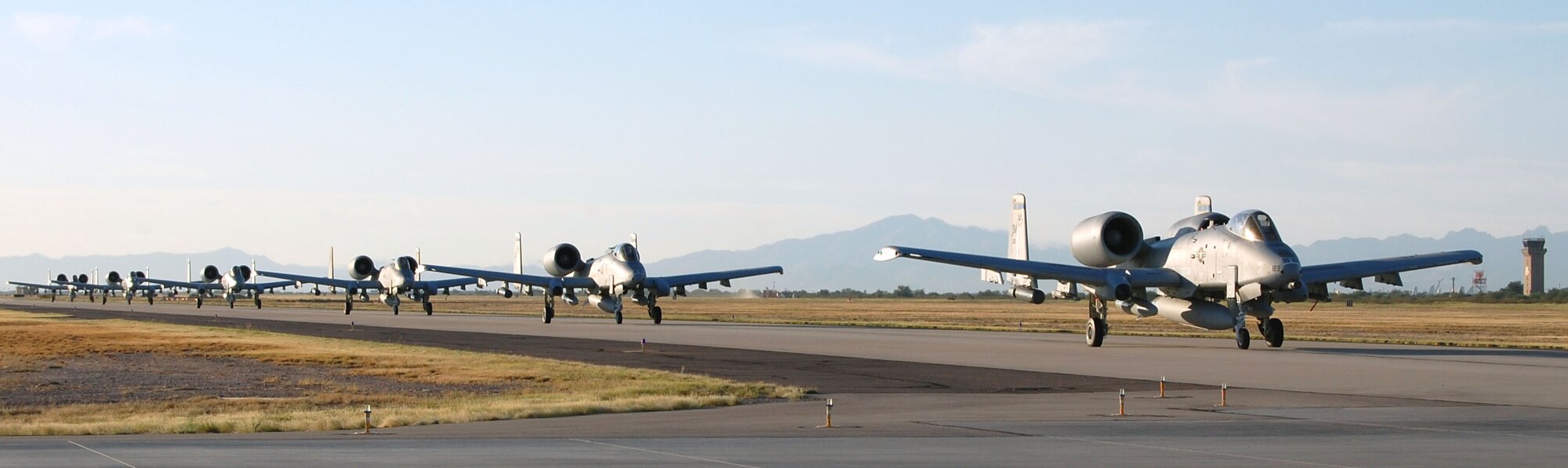 U. S. Air Force A-10 Thunderbolt II aircraft taxi down the runway as they prepare to takeoff for Bagram Airfield, Afghanistan. The aircraft and personnel will spend six months at the 455th Air Expeditionary Wing, flying and maintaining the A-10 in support of Operation Enduring Freedom. (Courtesy photo)