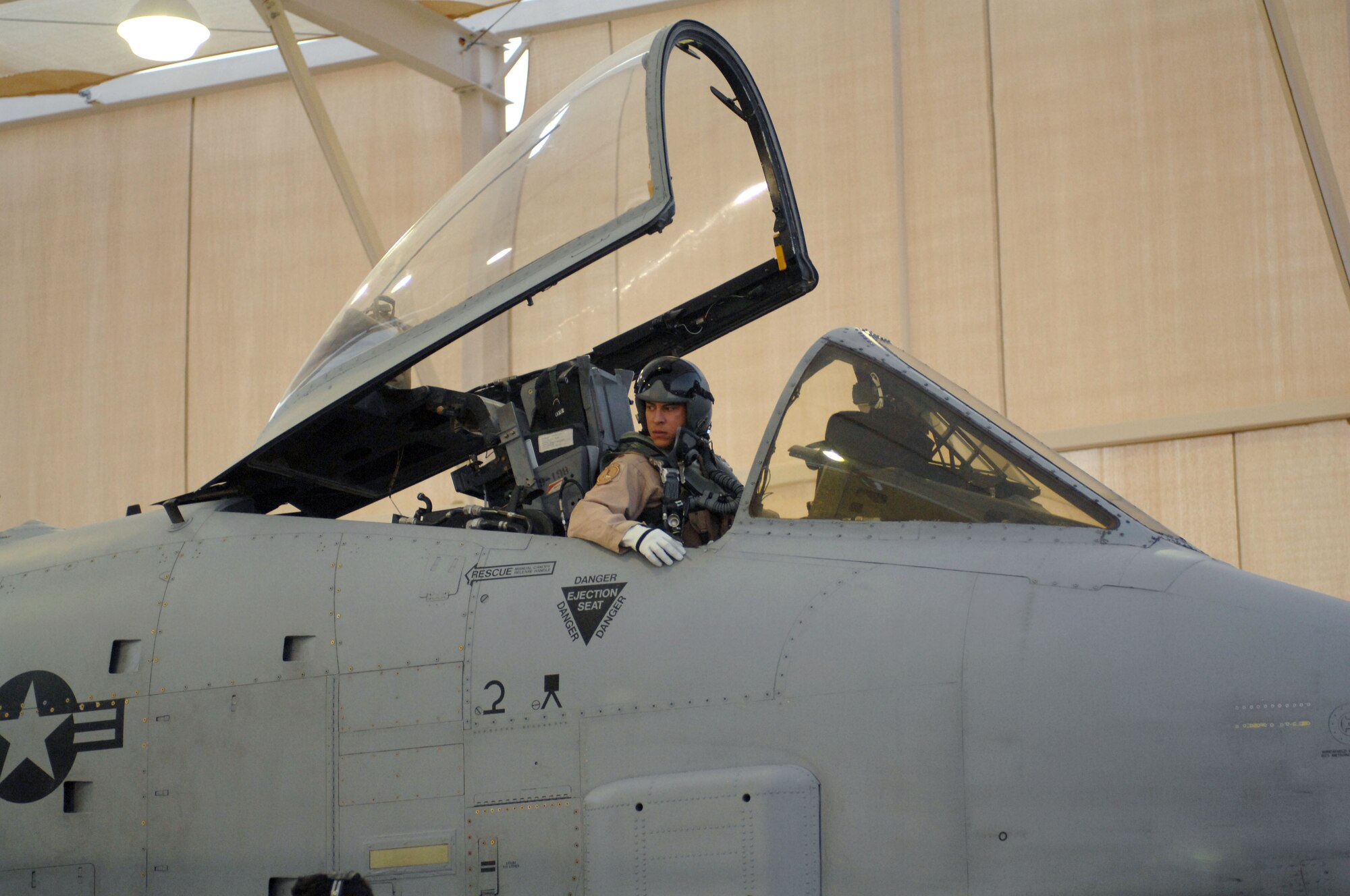 U. S. Air Force Maj. Andrew Tenenbaum, 354th Fighter Squadron, watches his crew chief go through the final pre-flight checks before he taxis down the flightline at Davis-Monthan Air Force Base, Ariz., Sept. 26, 2012. Major Tenenbaum is one of 400 members who deployed to Bagram Airfield, Afghanistan to support the 455th Air Expeditionary Wing, which serves U.S. Air Forces Central and provides close air support, combat search rescue, aerial intelligence, surveillance and reconnaissance, and airlift capabilities to U.S. and coalition forces supporting Operation Enduring Freedom. (U. S. Air Force photo by Airman 1st Class Saphfire Cook)