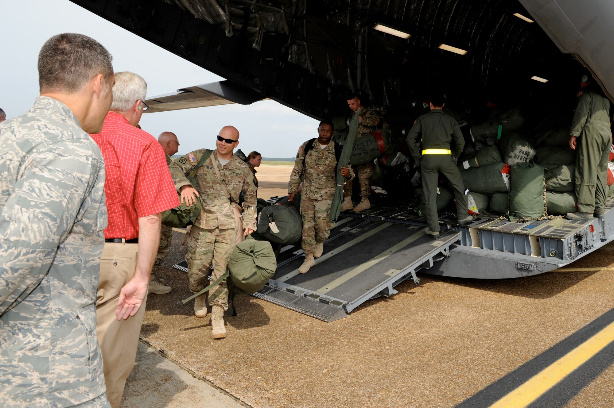 Members of the 223rd Engineer Battalion arrive at Columbus Air Force Base Sept. 29 after being deployed to Afghanistan for one year.  The battalion is an Army National Guard unit based out of West Point, Miss. and a forward support company based in Aberdeen, Miss.  (U.S. Air Force Photo/Elizabeth Owens)