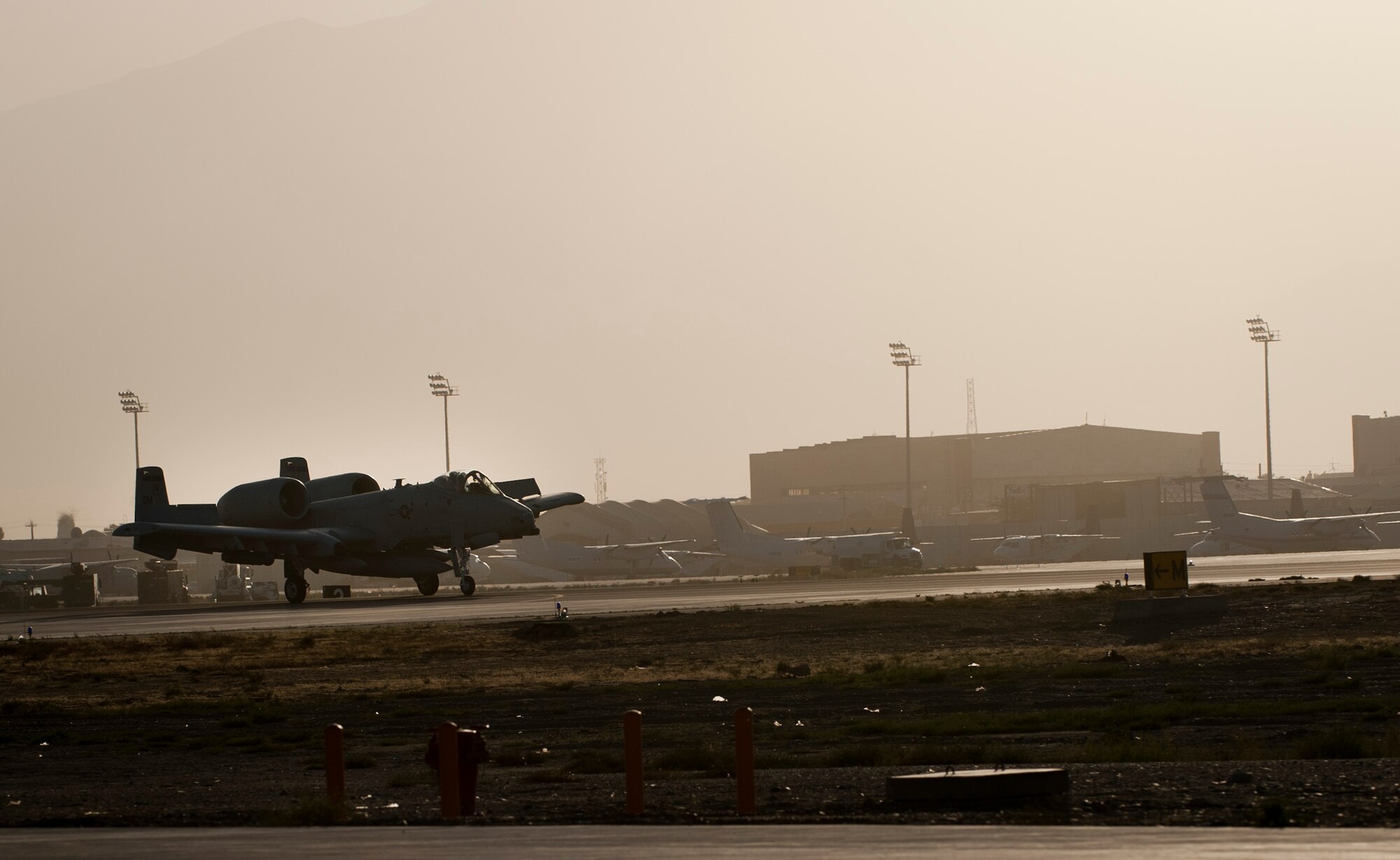 A U.S. Air Force A-10 Thunderbolt II from Davis-Monthan Air Force Base’s 354th Fighter Squadron lands at Bagram Air Field, Afghanistan, Oct. 3, 2012. The 354 FS ‘Bulldogs’ are relieving Bagram’s current team of Arkansas and Maryland Air National Guard A-10 aircrews and will soon take on the mission of providing daily close-air support to NATO and Afghan ground forces operating in Afghanistan. (U.S. Air Force Photo/Capt. Raymond Geoffroy)