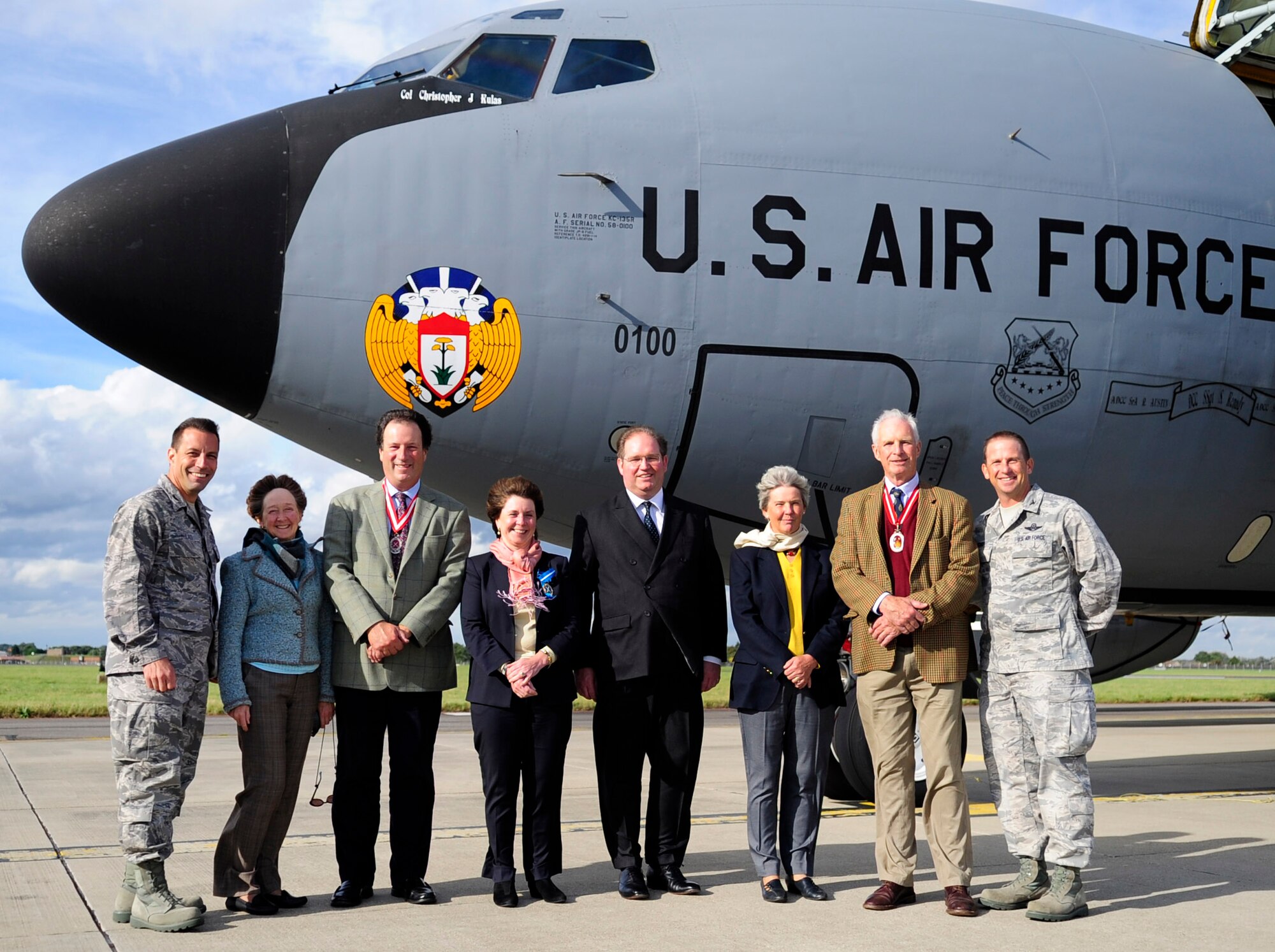 RAF MILDENHALL, England – Left, Col. Christopher Kulas, 100th Air Refueling Wing commander, and, right, Col. Kyle Voigt, 100th Air Refueling Wing vice commander, along with the High Sheriffs of Suffolk, Norfolk and Cambridgeshire, England and their spouses  pose for a group photo during a base tour Sept. 25, 2012, at RAF Mildenhall. The High Sheriffs and their spouses toured the air traffic control tower, the 100th Maintenance Group and a KC-135 Stratotanker and also toured RAF Lakenheath as part of an information tour. (U.S. Air Force photo/Senior Airman Ethan Morgan)