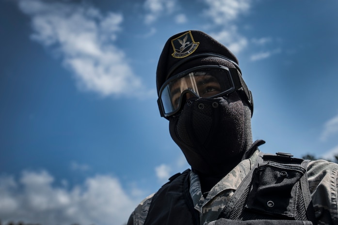 Staff Sgt. Ellis Bowles, 628th Security Forces Squadron, is ready for his turn to participate in an active shooter scenario Sept. 26, 2012, at Joint Base Charleston - Weapons Station, S.C. During the scenario, Airmen practiced entering a house under control of hostile forces and eliminated the threat while identifying and controlling non-hostile inhabitants. Security Forces Airmen test their skills and knowledge in simulated hostile environments to prepare for real-world events. (U.S. Air Force photo/Staff Sgt. Rasheen Douglas)