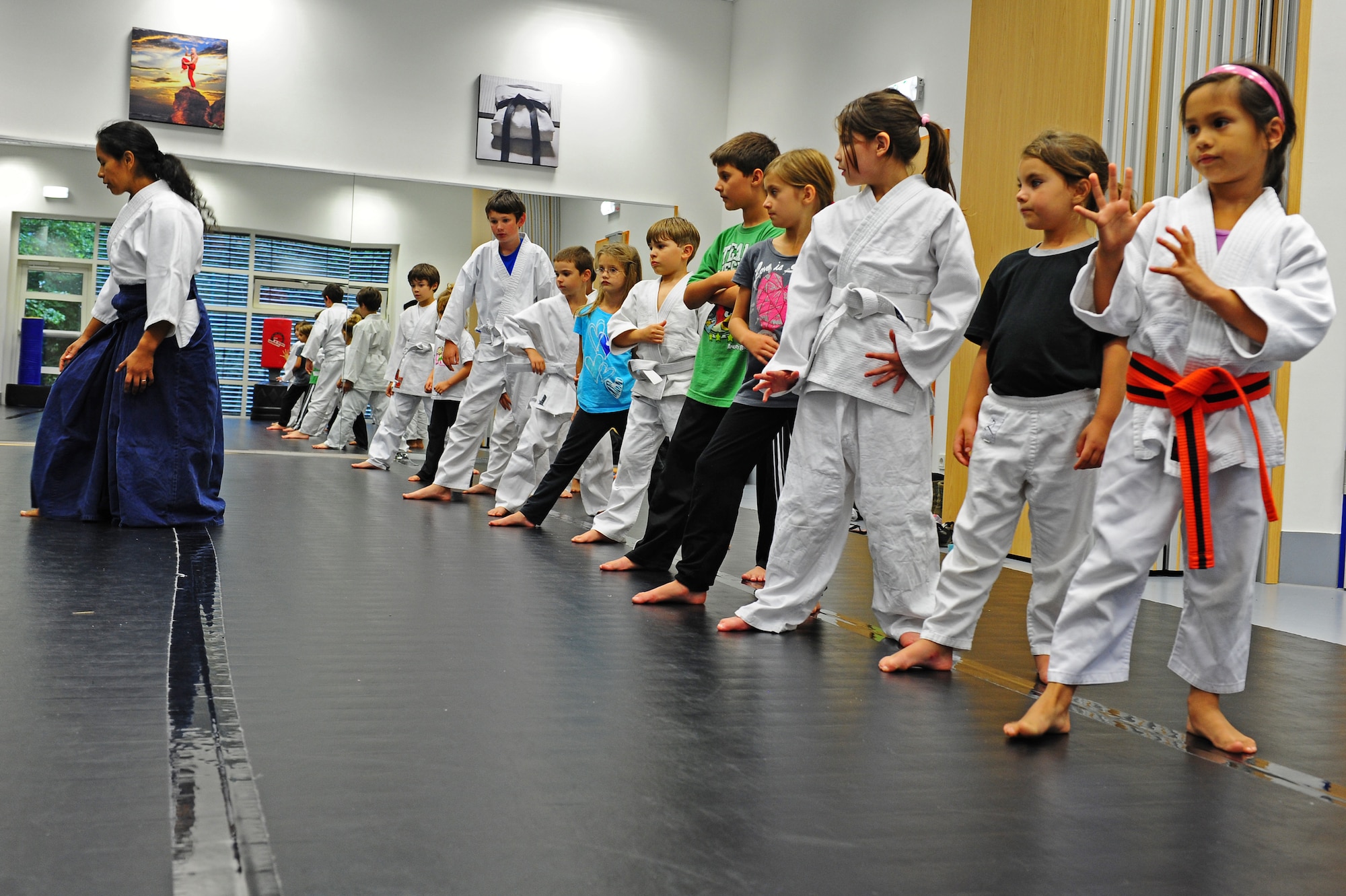 Members of the Youth Aikido class practice different defensive techniques at the Youth Center on Ramstein Air Base, Germany, Sept. 11, 2012. The children participate in the Aikido class to learn self-defense techniques Tuesdays from 5:45 to 6:30p.m. and 6:30 to 7:15p.m. (U.S. Air Force photo/Airman 1st Class Holly Cook) 