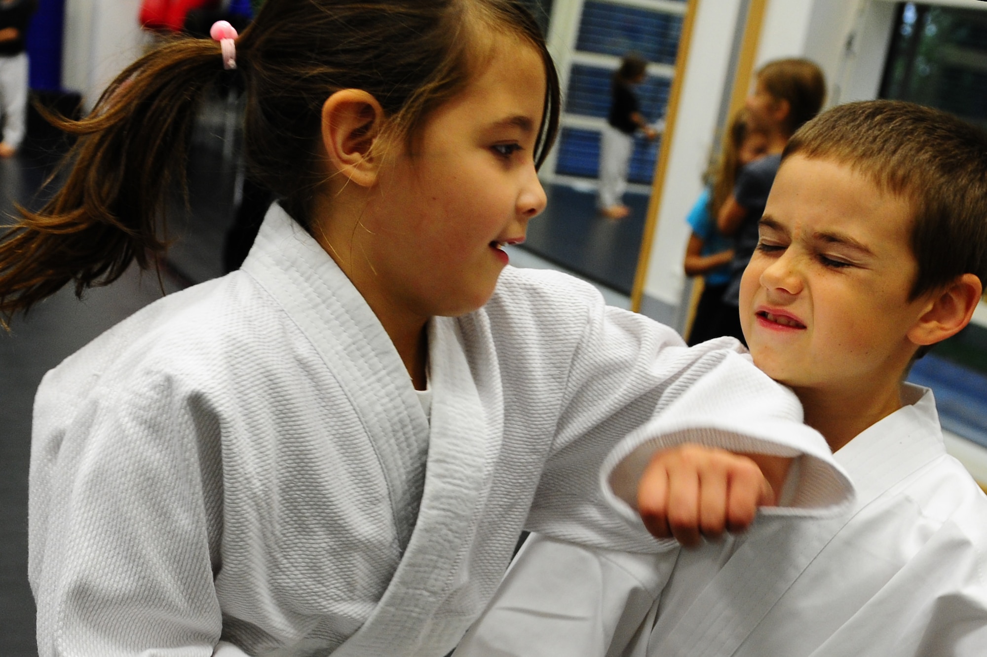 Members of the Youth Aikido class practice different defensive techniques at the Youth Center on Ramstein Air Base, Germany, Sept. 11, 2012. The children participate in the Aikido class to learn self-defense techniques Tuesdays from 5:45 to 6:30p.m. and 6:30 to 7:15p.m. (U.S. Air Force photo/Airman 1st Class Holly Cook) 