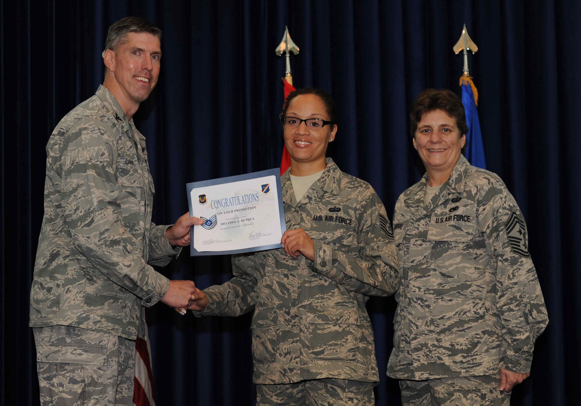 Melinda Bethea, 39th Communications Squadron, is promoted to the rank of  technical sergeant Sept. 28, 2012, at the club complex ballroom at Incirlik Air Base, Turkey. (U.S. Air Force photo by Senior Airman Anthony  Sanchelli/Released)