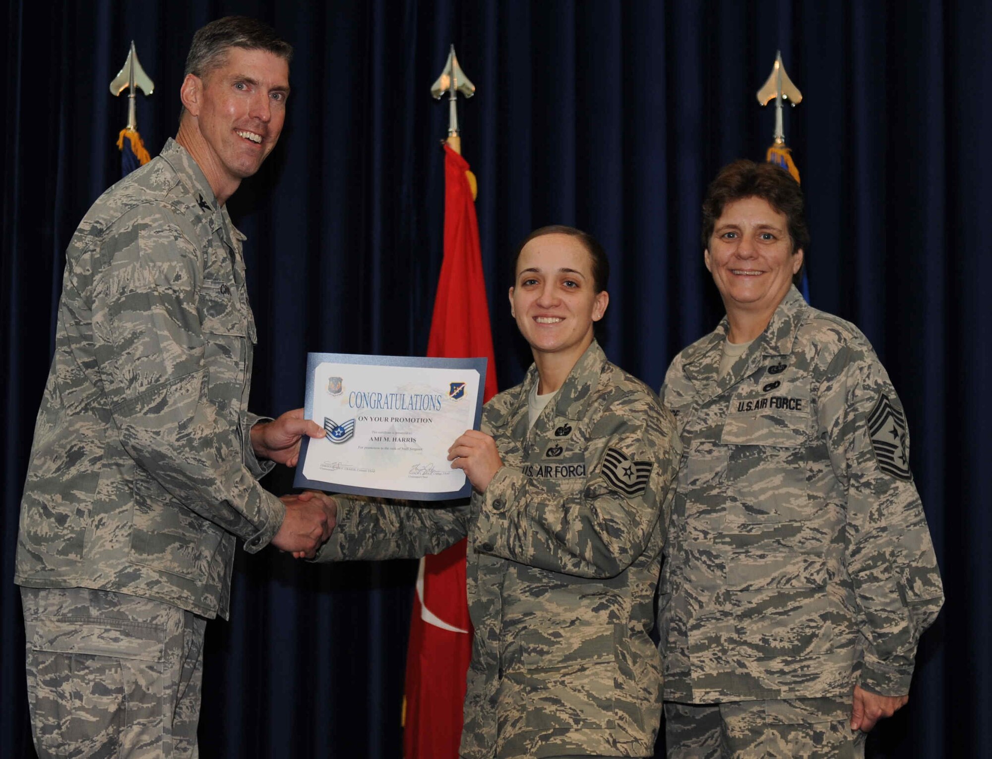 Ami Harris, 39th Air Base Wing, is promoted to the rank of  technical sergeant Sept. 28, 2012, at the club complex ballroom at Incirlik Air Base, Turkey. (U.S. Air Force photo by Senior Airman Anthony  Sanchelli/Released)