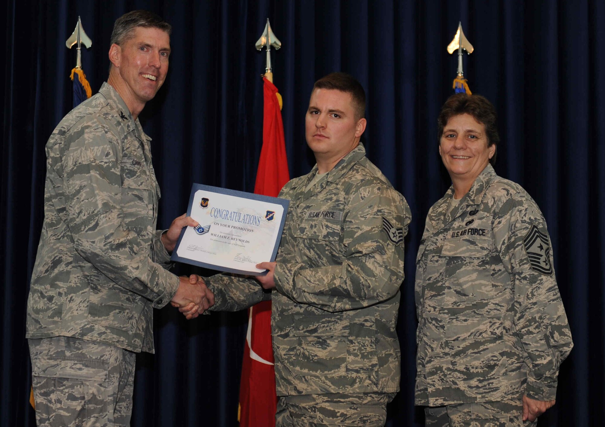 William Reynolds, 39th Communications Squadron, is promoted to the rank of  staff sergeant Sept. 28, 2012, at the club complex ballroom at Incirlik Air Base, Turkey. (U.S. Air Force photo by Senior Airman Anthony  Sanchelli/Released)