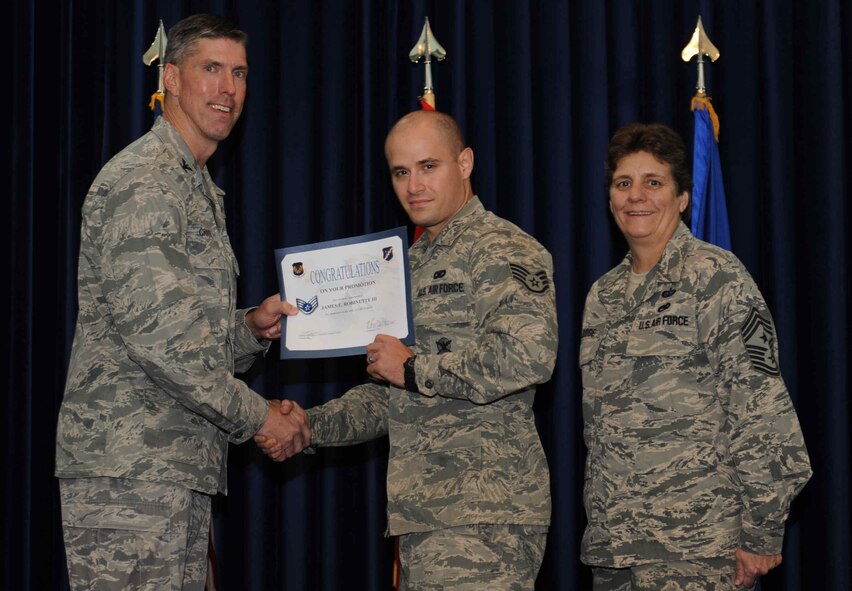 James Robinette, 39th Security Forces Squadron, is promoted to the rank of  staff sergeant Sept. 28, 2012, at the club complex ballroom at Incirlik Air Base, Turkey. (U.S. Air Force photo by Senior Airman Anthony  Sanchelli/Released)