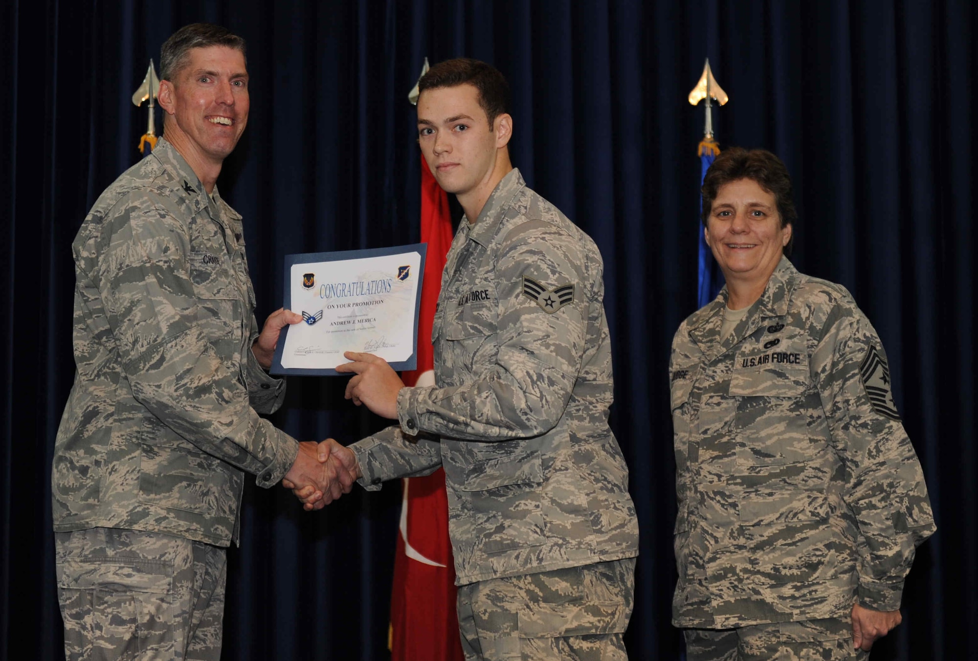 Andrew Merica, 39th Communications Squadron, is promoted to the rank of  senior airman Sept. 28, 2012, at the club complex ballroom at Incirlik Air Base, Turkey. (U.S. Air Force photo by Senior Airman Anthony  Sanchelli/Released)