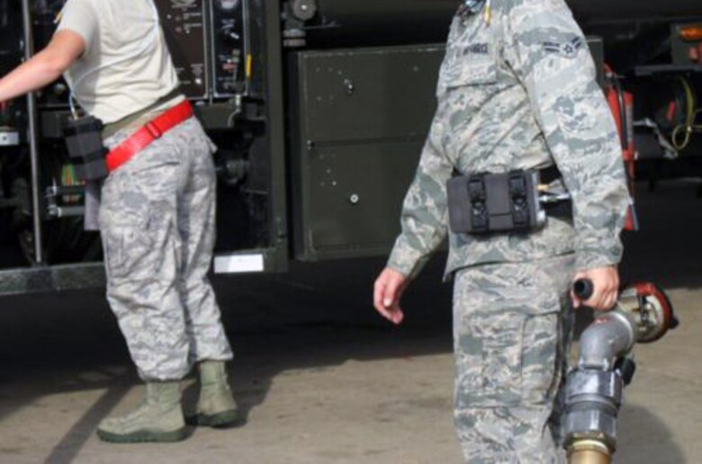 U.S. Air Force fuel handlers wear the current belt pack version of the naphthalene dosimeter during testing. U.S. Army Corps of Engineers Sacramento District senior toxicologist Dr. Janis Hulla is part of a multidisciplinary team developing the device that could give instant warning of chemical overexposure.