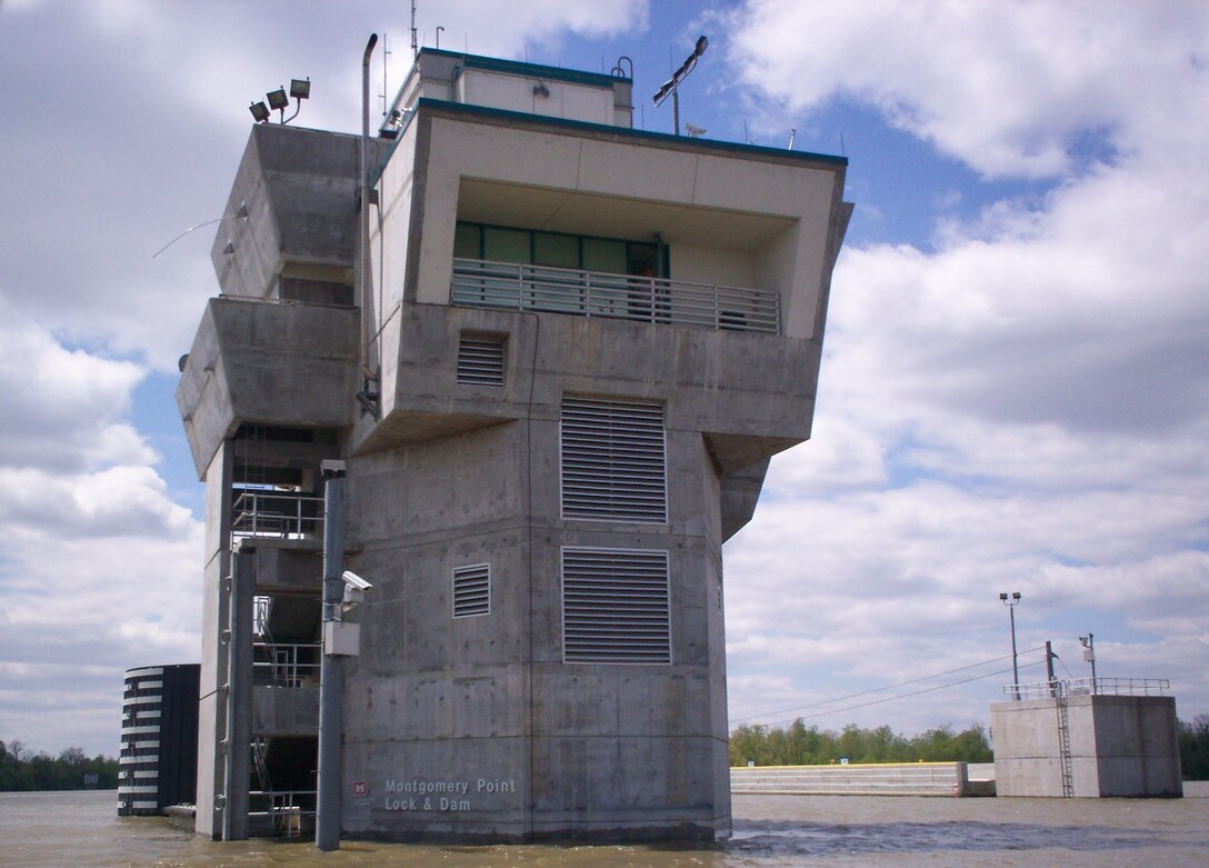 Montgomery Point Lock and Dam control tower in the water during the flood of 2008. The control tower is built to withstand large fluctuations in the water surface elevation.