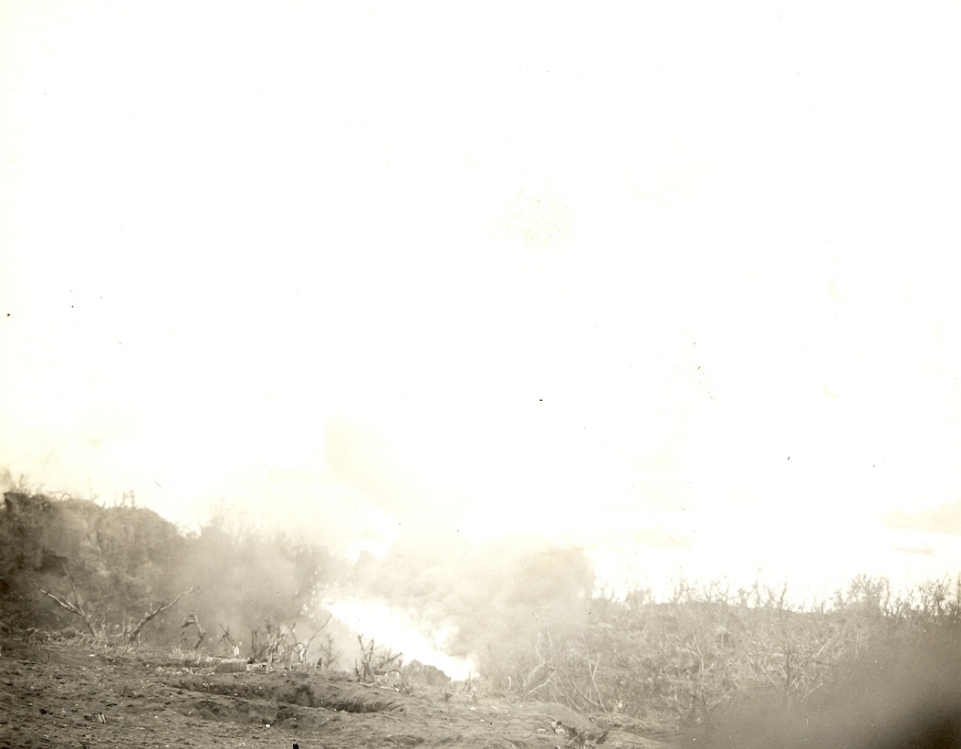 Eliminating Japanese resistance in caves on Saipan.