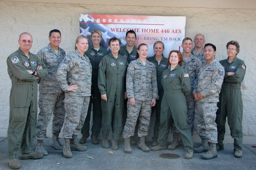 Reservists with the 446th Aeromedical Evacuation Squadron out of McChord Field, Wash., are welcomed back home, Oct. 3, after being deployed from numerous locations around the world. About 30 flight nurses, Medical Service Corps officers, and flight medics had been supporting Operation Enduring Freedom since April. (U.S. Air Force photo by Sandra Pishner) 