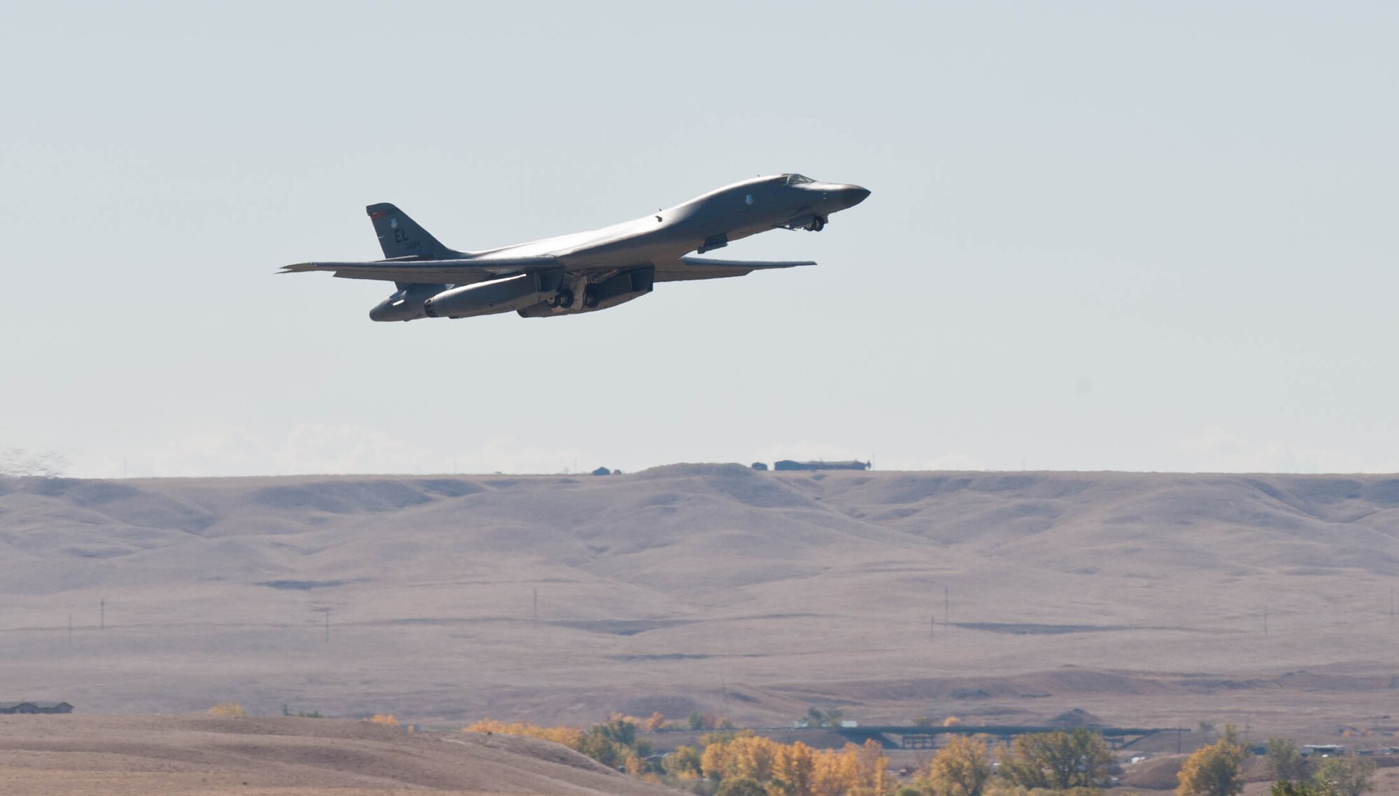 A loaded B-1 bomber takes off during the final phase of the Global Strike Challenge at Ellsworth Air Force Base, S.D., Oct. 1, 2012. Global Strike Challenge is the world's premier competition for bomber crews, Intercontinental Ballistic Missile crews and security forces, and includes units from Air Combat Command, Air Force Global Strike Command, Air Force Reserve Command and the Air National Guard. (U.S. Air Force photo by Airman 1st Class Zachary Hada/Released)
