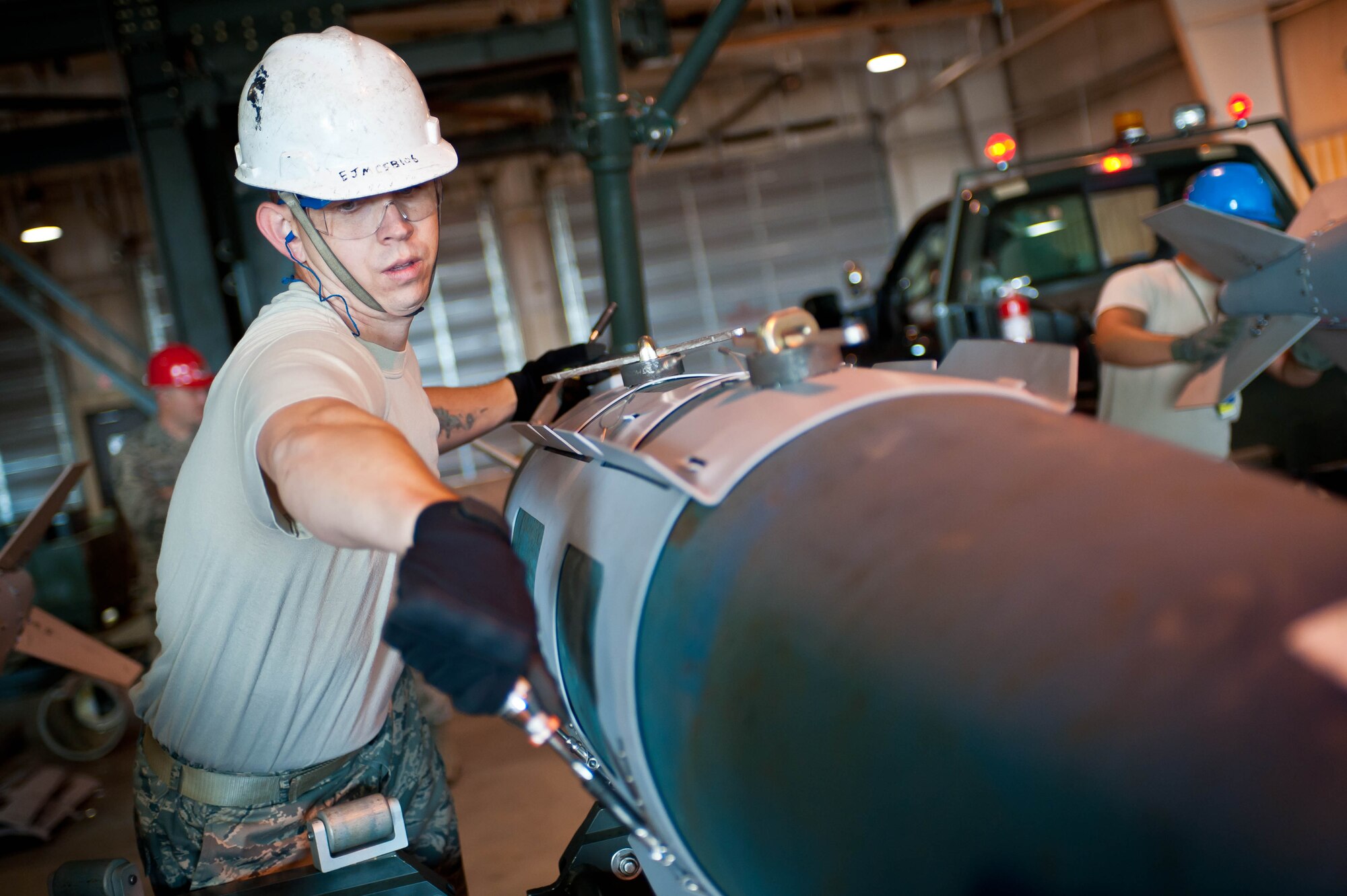 Tech. Sgt. Darrel Rinde, 28th Munitions Squadron munitions inspector, assembles and inspects munitions during the Global Strike Challenge at Ellsworth Air Force Base, S.D., Oct. 1, 2012. The Ellsworth munitions team assembled and loaded 12 GBU-31 version one and six GBU-31 version three munitions during the competition. (U.S. Air Force photo by Airman 1st Class Zachary Hada/Released)
