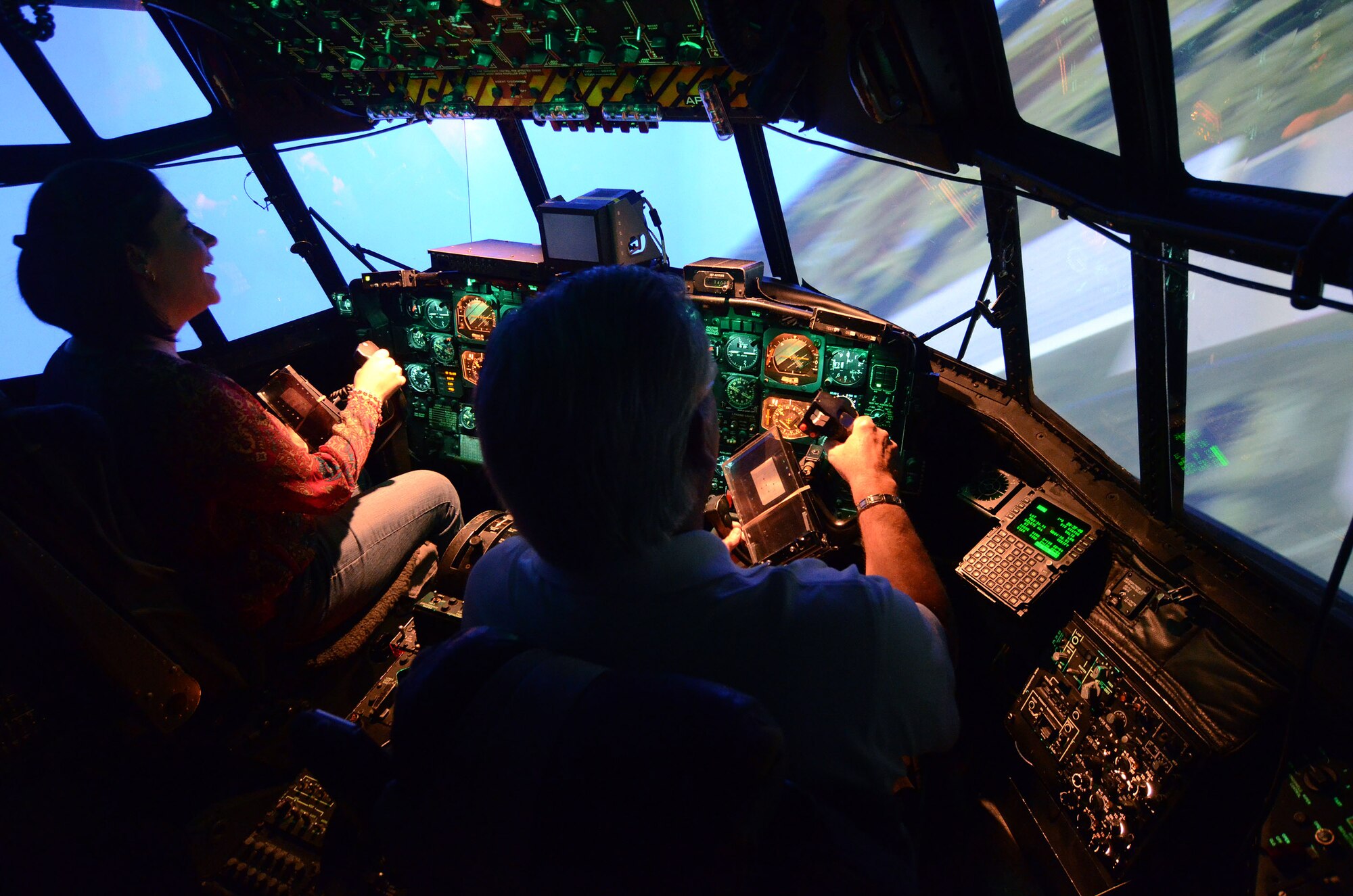 A Greater Pittsburgh Honorary Commanders Association member enjoys a few minutes of flying in the left seat of the eastern regional C-130 flight simulator at Dobbins Air Reserve on Oct. 2.   The members of the HCA came to Dobbins to better familiarize themselves with different aspects of the military.  (U.S. Air Force photo/Brad Fallin)