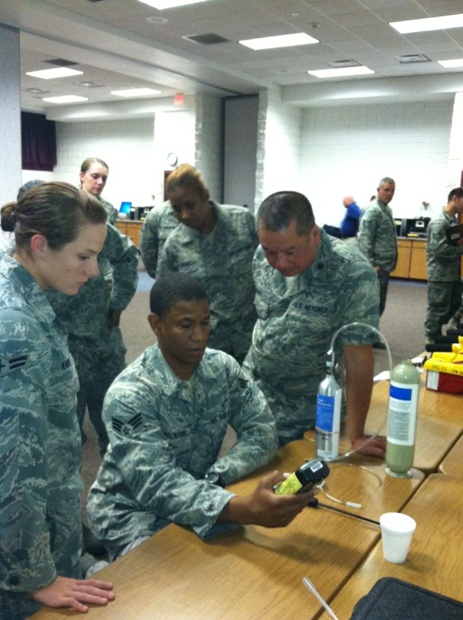 Staff Sgt. Andrew Beckford, 102nd Bioenvironmental Engineering, demonstrates proper calibration of a Multi Gas Detector. (Air National Guard photo by Master Sgt. Keith Delgado/Released)