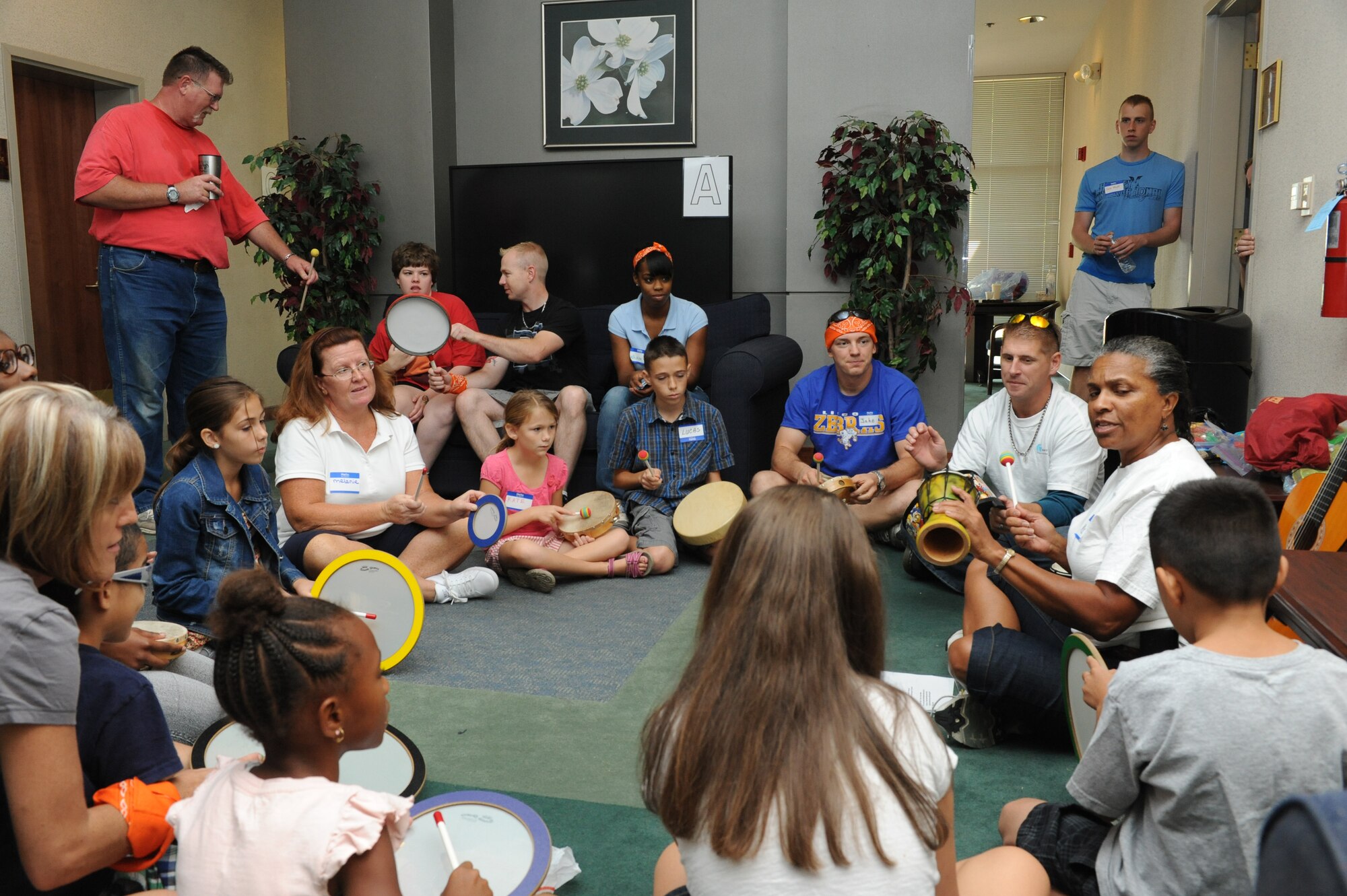 Volunteers and organizations from the base and the community gathered at Beale Air Force Base, Calif., Sept. 29, 2012, for a Special Needs Fair . Volunteers interacted with children through music, movement, instrument and song.  (U.S. Air Force photo by Sean Bhakta/Released)
