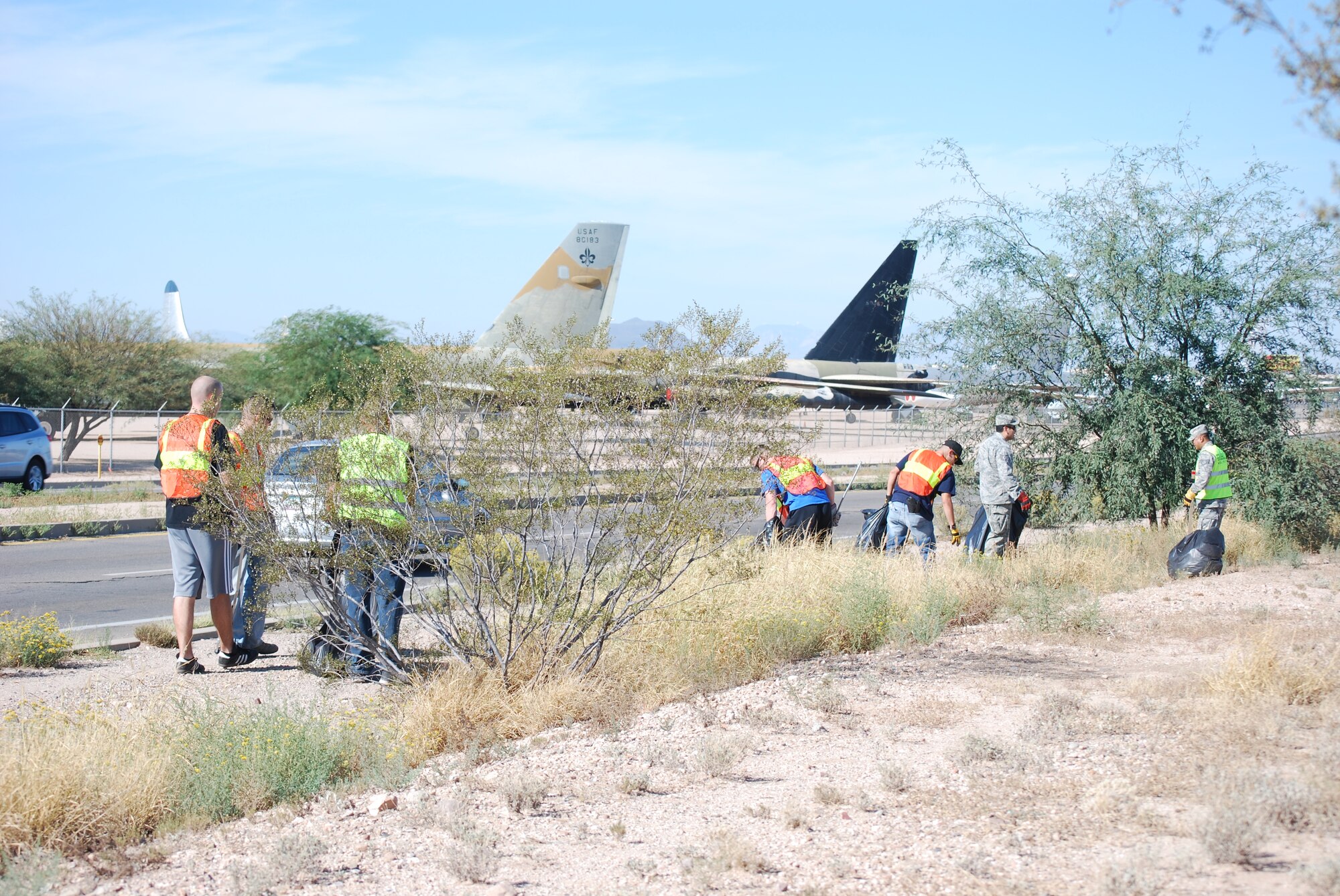 Members of 12th Air Force (Air Forces Southern) volunteer as part of the Tucson Clean and Beautiful program to clear area roadways of trash and debris Oct. 4. More than 20 volunteers participated in the program, clearing a mile-long stretch of highway near the Pima Air Museum in Tucson, Ariz.  12th AF (AFSOUTH), based at nearby Davis-Monthan AFB, is responsible for the combat readiness of 10 active-duty wings by preparing Airmen and more than 730 aircraft for worldwide deployments, including in direct support of combat operations in Afghanistan.  In the organization’s AFSOUTH role, Airmen plan and coordinate U.S. Air Force involvement and partnership building efforts throughout Central America, South America and the Caribbean.  (U.S. Air Force photo by Capt. Justin Brockhoff/Released)