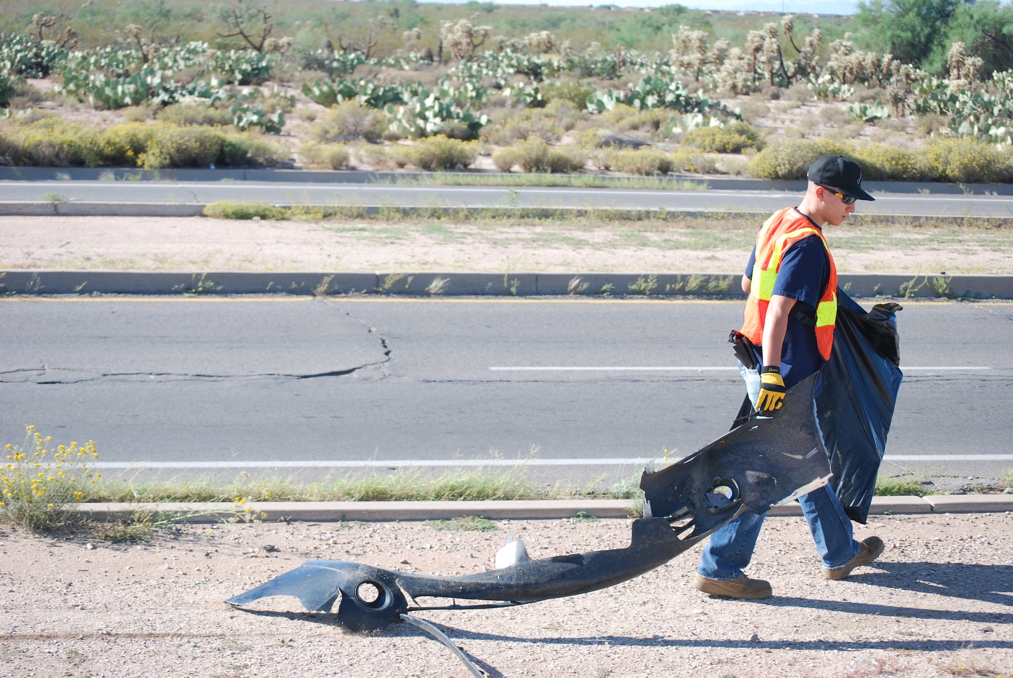 Members of 12th Air Force (Air Forces Southern) volunteer as part of the Tucson Clean and Beautiful program to clear area roadways of trash and debris Oct. 4. More than 20 volunteers participated in the program, clearing a mile-long stretch of highway near the Pima Air Museum in Tucson, Ariz.  12th AF (AFSOUTH), based at nearby Davis-Monthan AFB, is responsible for the combat readiness of 10 active-duty wings by preparing Airmen and more than 730 aircraft for worldwide deployments, including in direct support of combat operations in Afghanistan.  In the organization’s AFSOUTH role, Airmen plan and coordinate U.S. Air Force involvement and partnership building efforts throughout Central America, South America and the Caribbean.  (U.S. Air Force photo by Capt. Justin Brockhoff/Released)