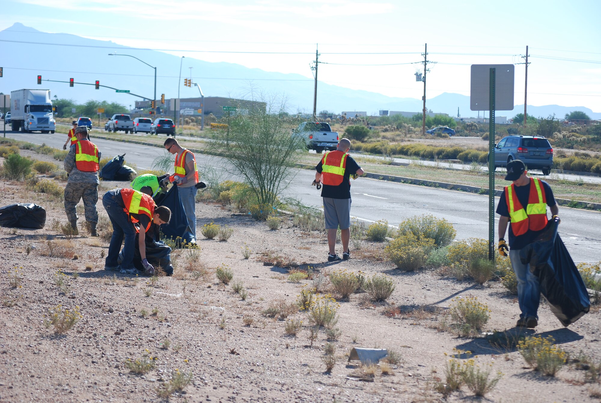 Members of 12th Air Force (Air Forces Southern) volunteer as part of the Tucson Clean and Beautiful program to clear area roadways of trash and debris Oct. 4. More than 20 volunteers participated in the program, clearing a mile-long stretch of highway near the Pima Air Museum in Tucson, Ariz.  12th AF (AFSOUTH), based at nearby Davis-Monthan AFB, is responsible for the combat readiness of 10 active-duty wings by preparing Airmen and more than 730 aircraft for worldwide deployments, including in direct support of combat operations in Afghanistan.  In the organization’s AFSOUTH role, Airmen plan and coordinate U.S. Air Force involvement and partnership building efforts throughout Central America, South America and the Caribbean.  (U.S. Air Force photo by Capt. Justin Brockhoff/Released)