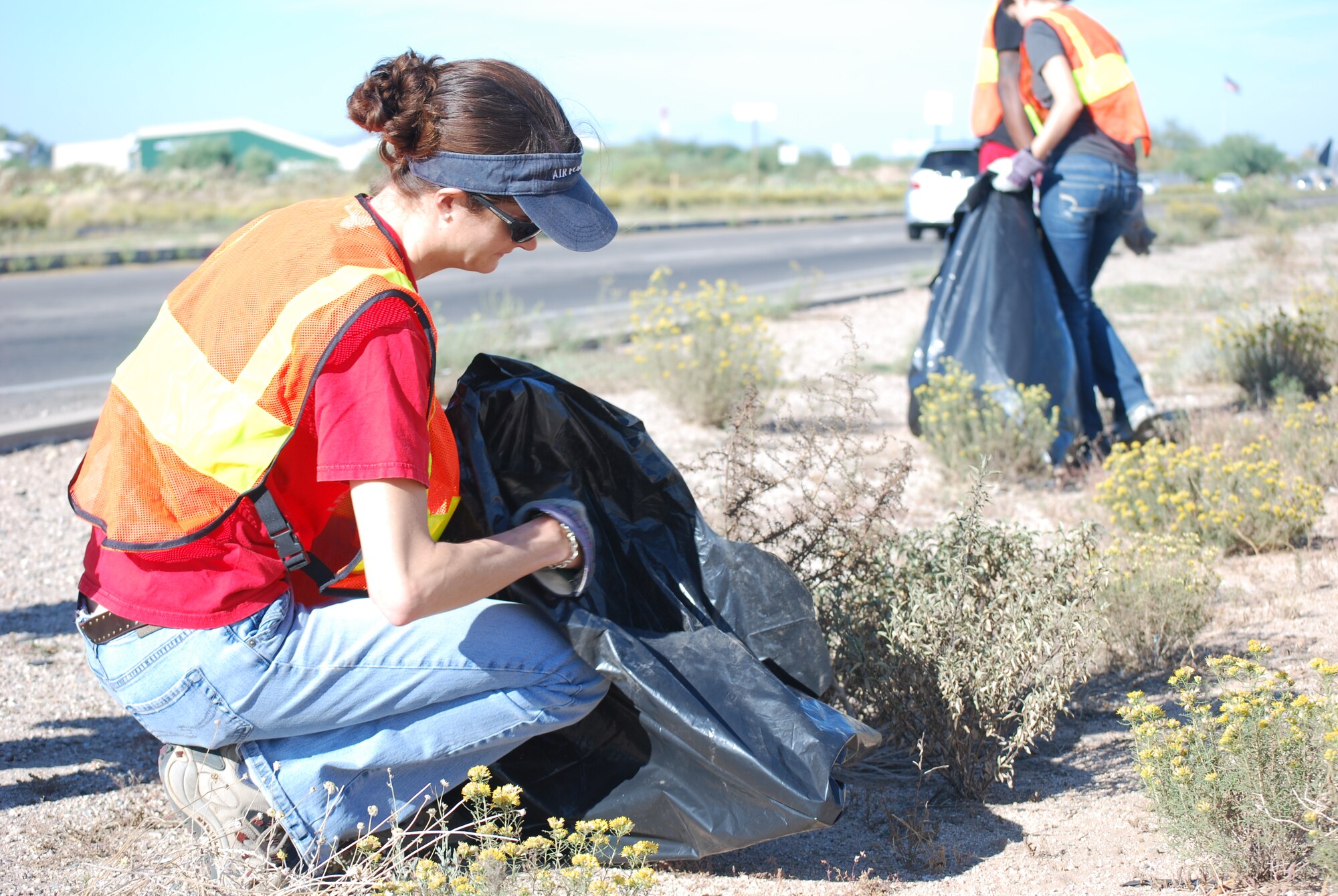 Members of 12th Air Force (Air Forces Southern) volunteer as part of the Tucson Clean and Beautiful program to clear area roadways of trash and debris Oct. 4. More than 20 volunteers participated in the program, clearing a mile-long stretch of highway near the Pima Air Museum in Tucson, Ariz.  12th AF (AFSOUTH), based at nearby Davis-Monthan AFB, is responsible for the combat readiness of 10 active-duty wings by preparing Airmen and more than 730 aircraft for worldwide deployments, including in direct support of combat operations in Afghanistan.  In the organization’s AFSOUTH role, Airmen plan and coordinate U.S. Air Force involvement and partnership building efforts throughout Central America, South America and the Caribbean.  (U.S. Air Force photo by Capt. Justin Brockhoff/Released)