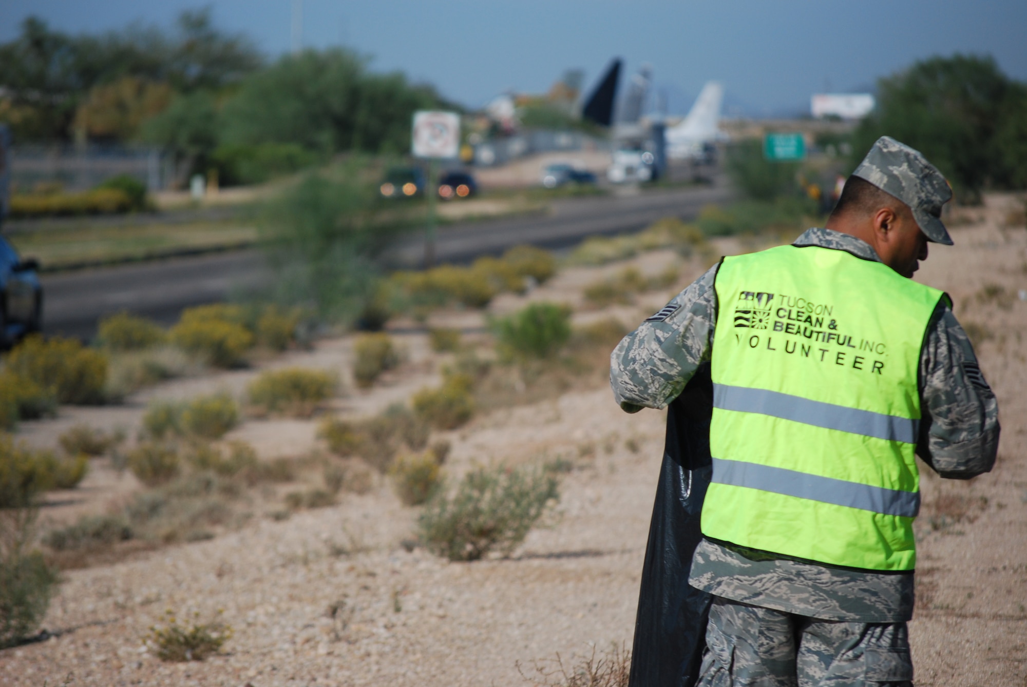 Members of 12th Air Force (Air Forces Southern) volunteer as part of the Tucson Clean and Beautiful program to clear area roadways of trash and debris Oct. 4. More than 20 volunteers participated in the program, clearing a mile-long stretch of highway near the Pima Air Museum in Tucson, Ariz.  12th AF (AFSOUTH), based at nearby Davis-Monthan AFB, is responsible for the combat readiness of 10 active-duty wings by preparing Airmen and more than 730 aircraft for worldwide deployments, including in direct support of combat operations in Afghanistan.  In the organization’s AFSOUTH role, Airmen plan and coordinate U.S. Air Force involvement and partnership building efforts throughout Central America, South America and the Caribbean.  (U.S. Air Force photo by Capt. Justin Brockhoff/Released)